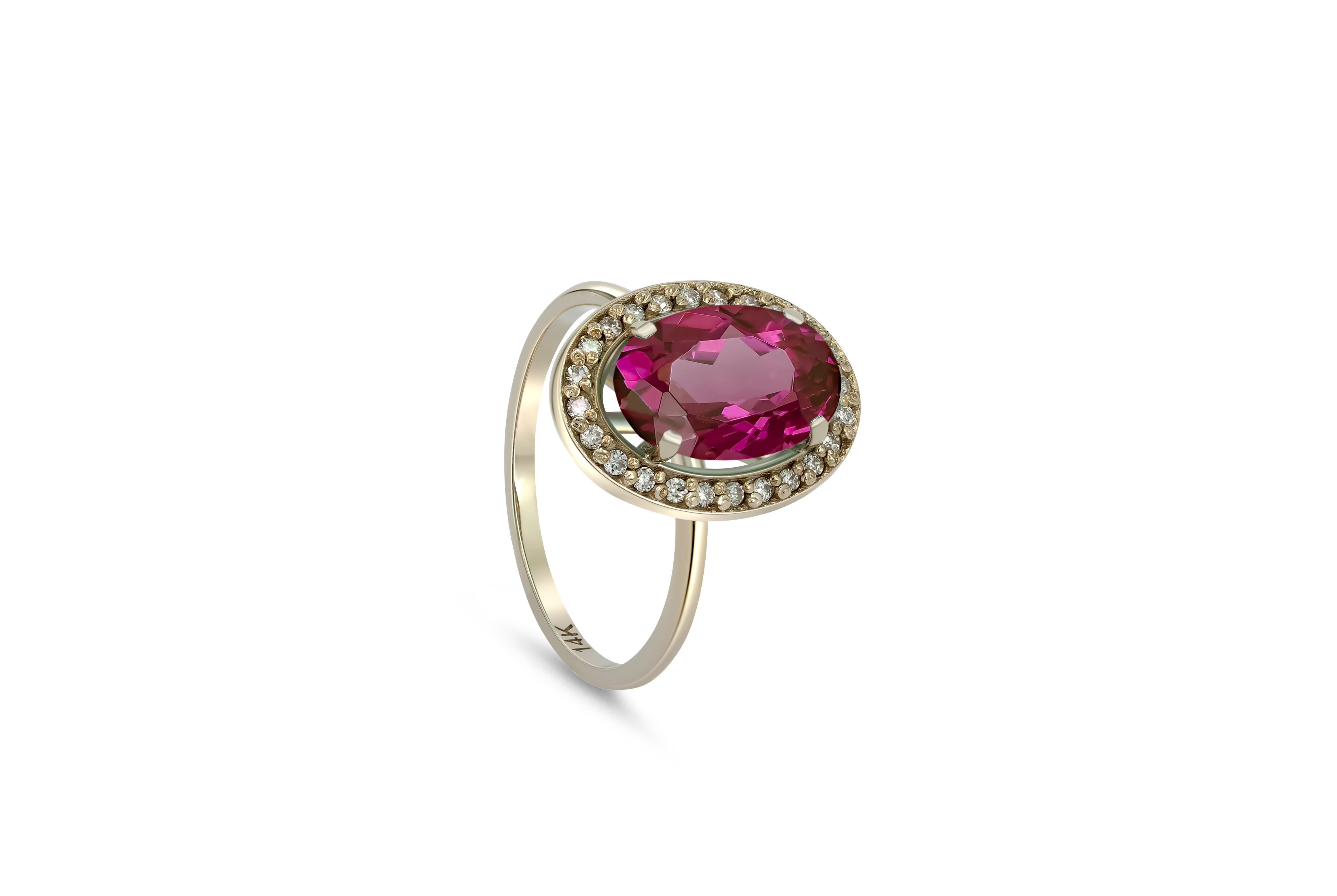 Ruby and diamonds 14k gold ring. 
Oval Ruby gold ring.  Ruby diamond halo ring. Pink gemstone ring. July birthstone ring.

Metal: 14k gold
Weight: 3 gr depends from size

Gemstones:
Ruby - 1 piece
Cut - oval
Color - pink
Weight - 3-3.2 ct

Side