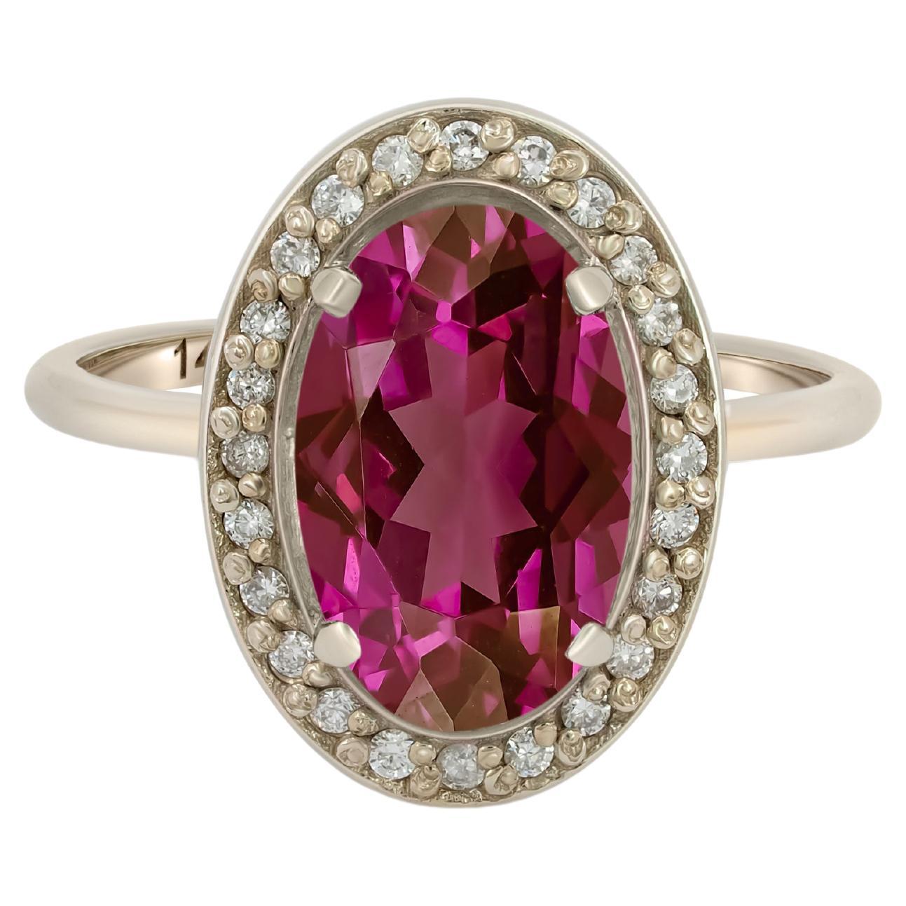 Ruby and diamonds 14k gold ring.