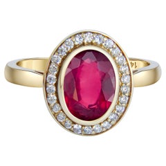 Used Ruby and diamonds 14k gold ring.