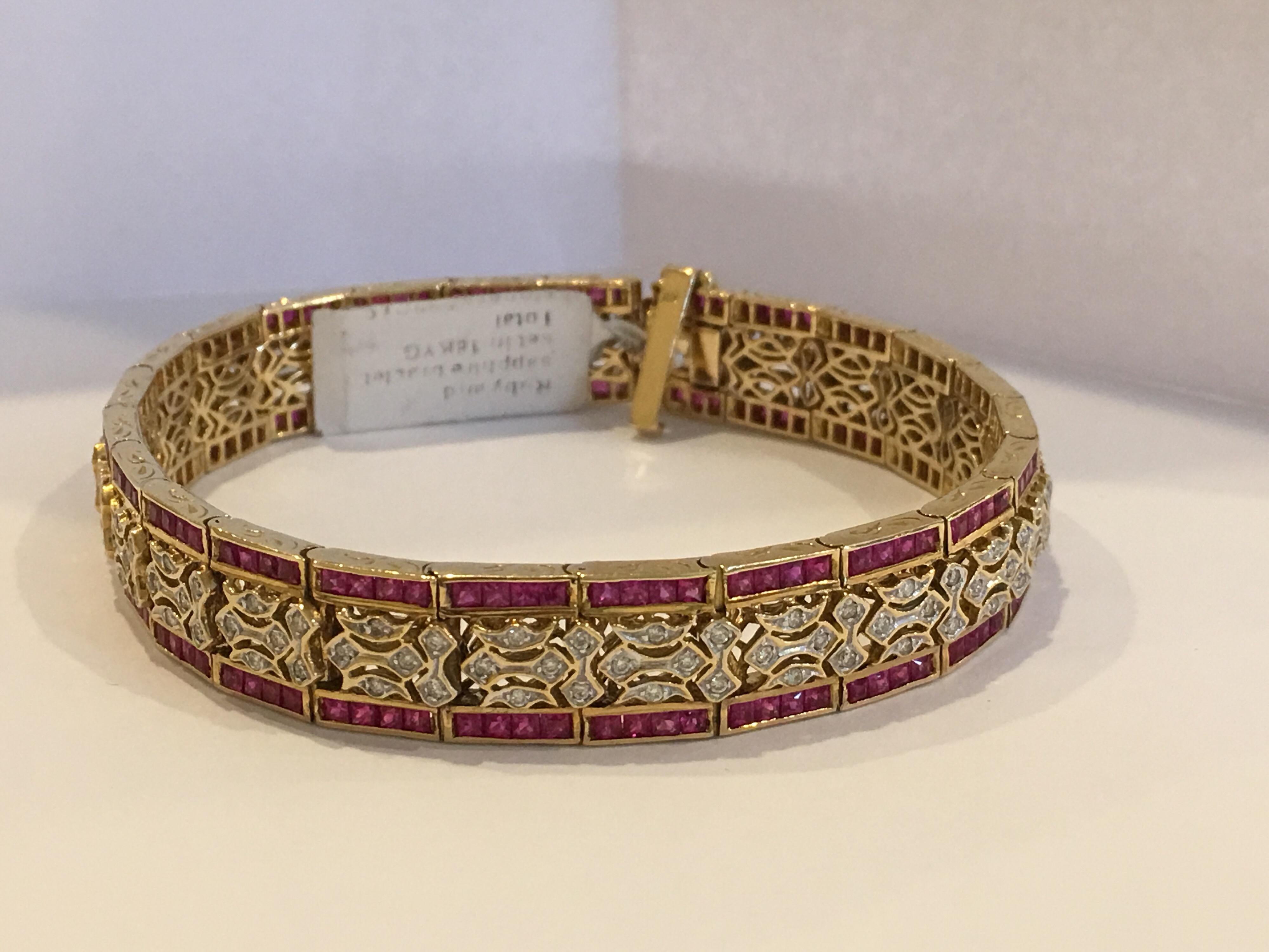 Ruby and Diamonds Bracelet set in 18 K Yellow Gold.
One of a Kind Hand crafted Bracelet.
