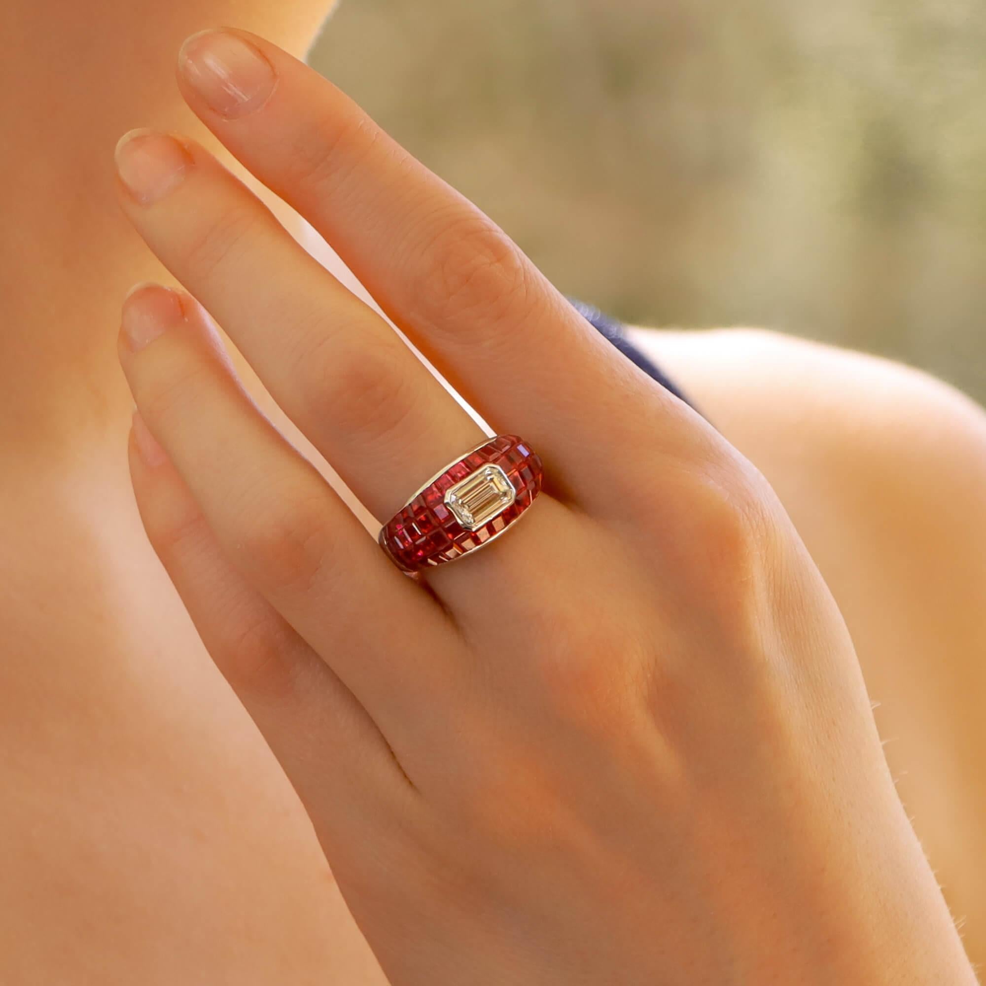 A breathtaking ruby and diamond bombé cocktail ring, set in platinum. 

This spectacular piece is designed in a bombé design and is invisibly set throughout with square cut rubies. All of the rubies have been perfectly matched in colour and
