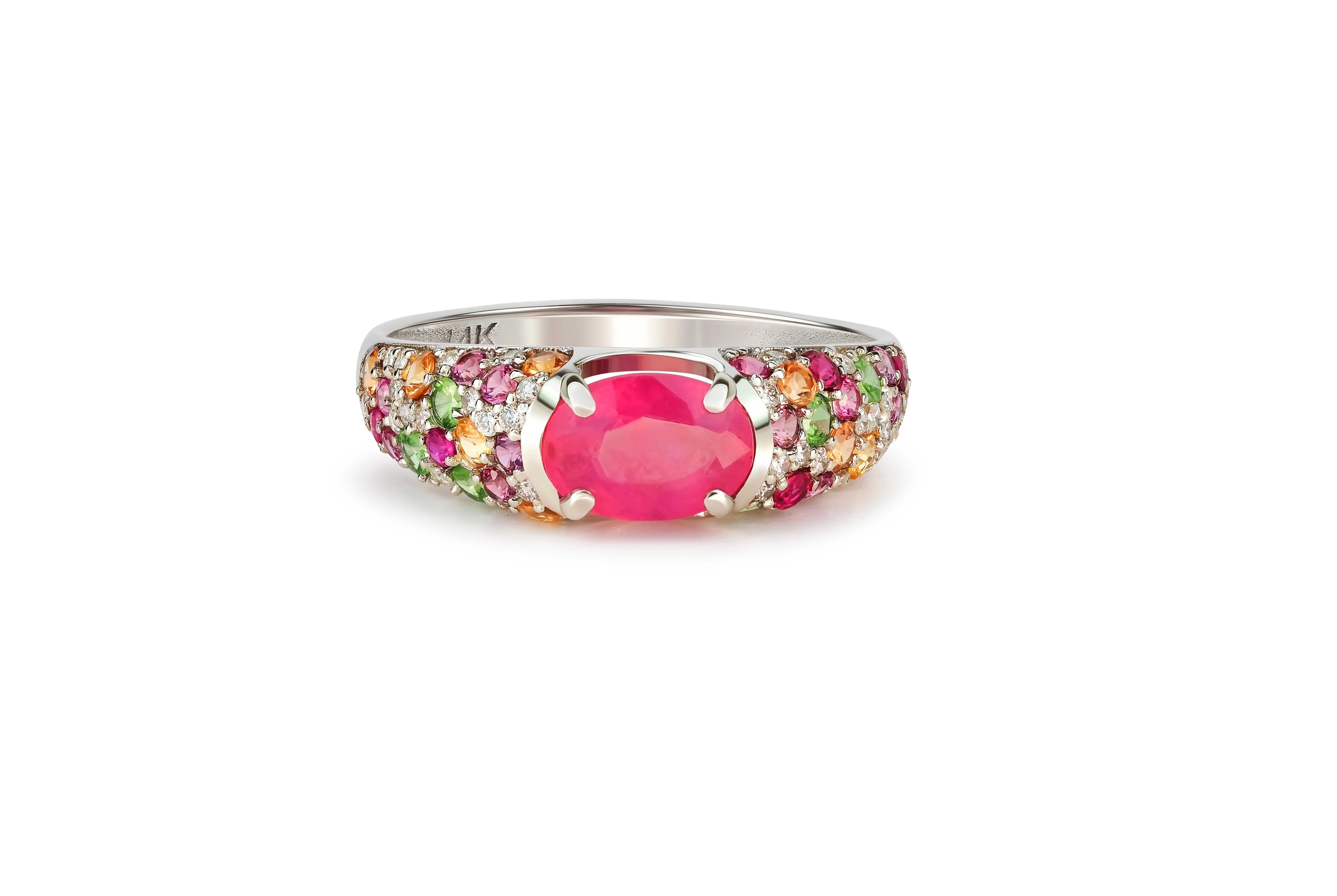 14k gold ruby and multicolored gemstones ring.
14k white gold
Total weight: 2 gr depends from size

Ruby
color: pink to red depends from light
clarity: transparent
cut: oval
weight: 1.2 ct

Other gemstones:

Sapphires and tsavorites: yellow, green