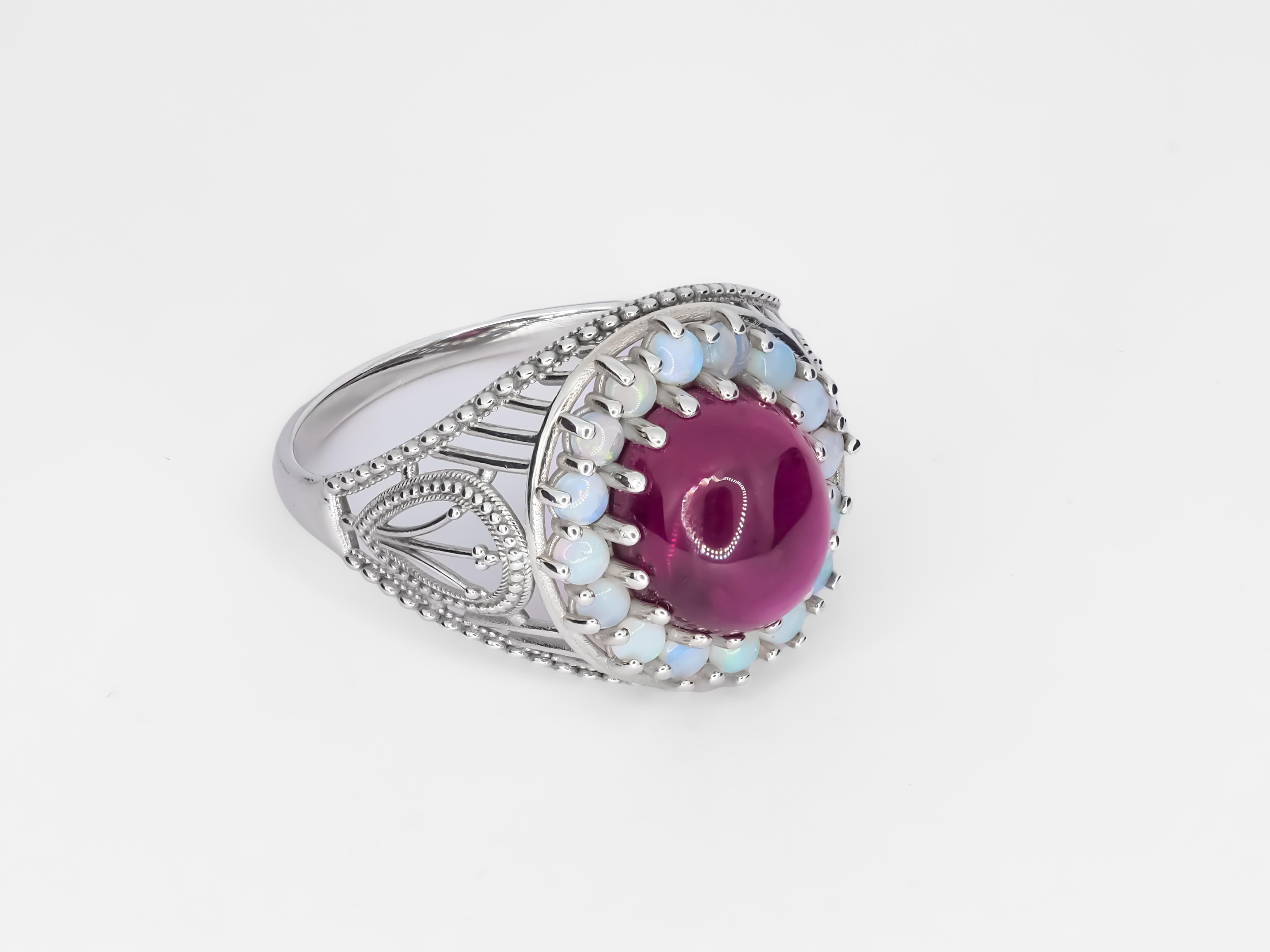 in vendita:  Anello massiccio di rubini e opali 5