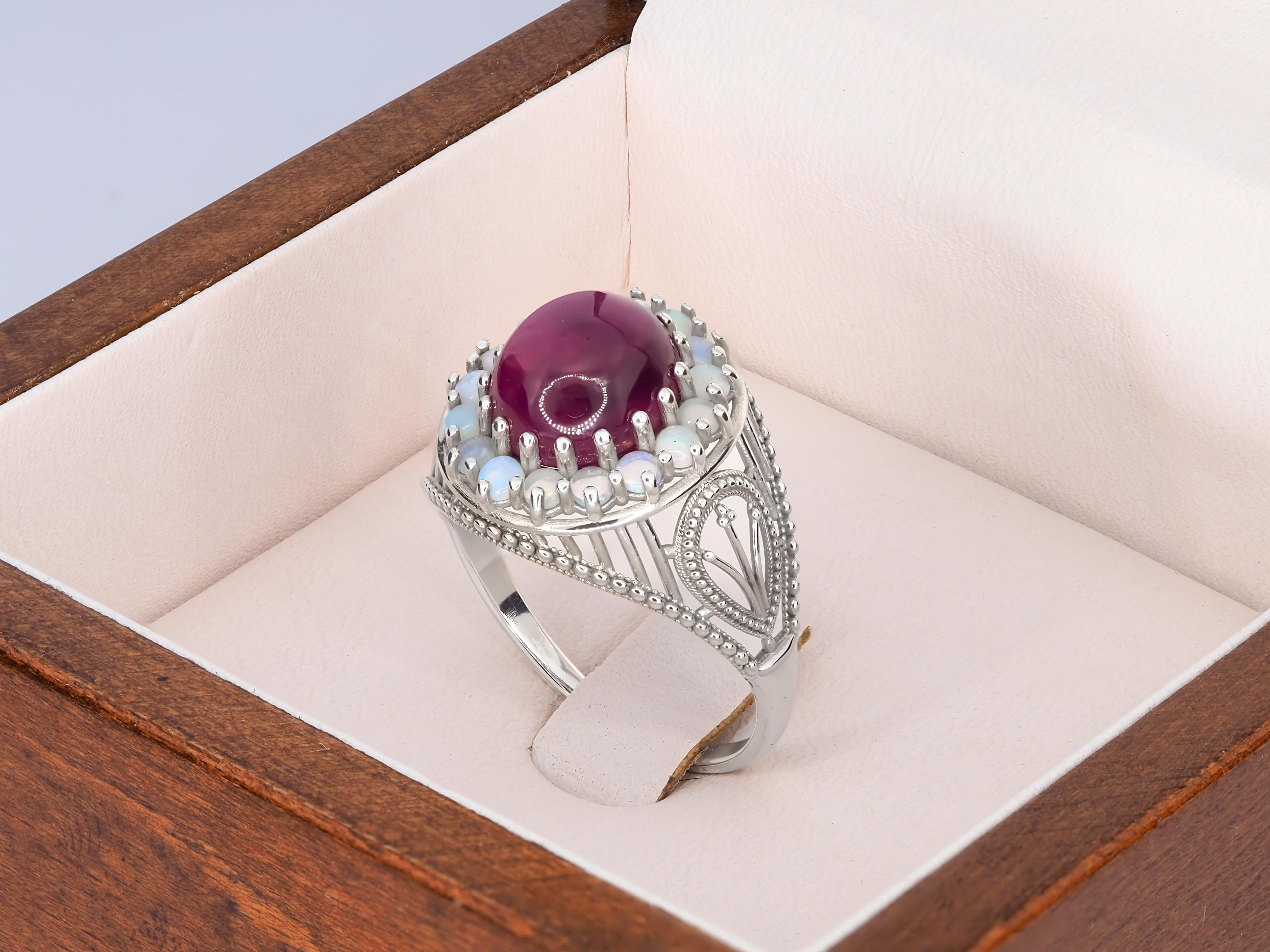 in vendita:  Anello massiccio di rubini e opali 8