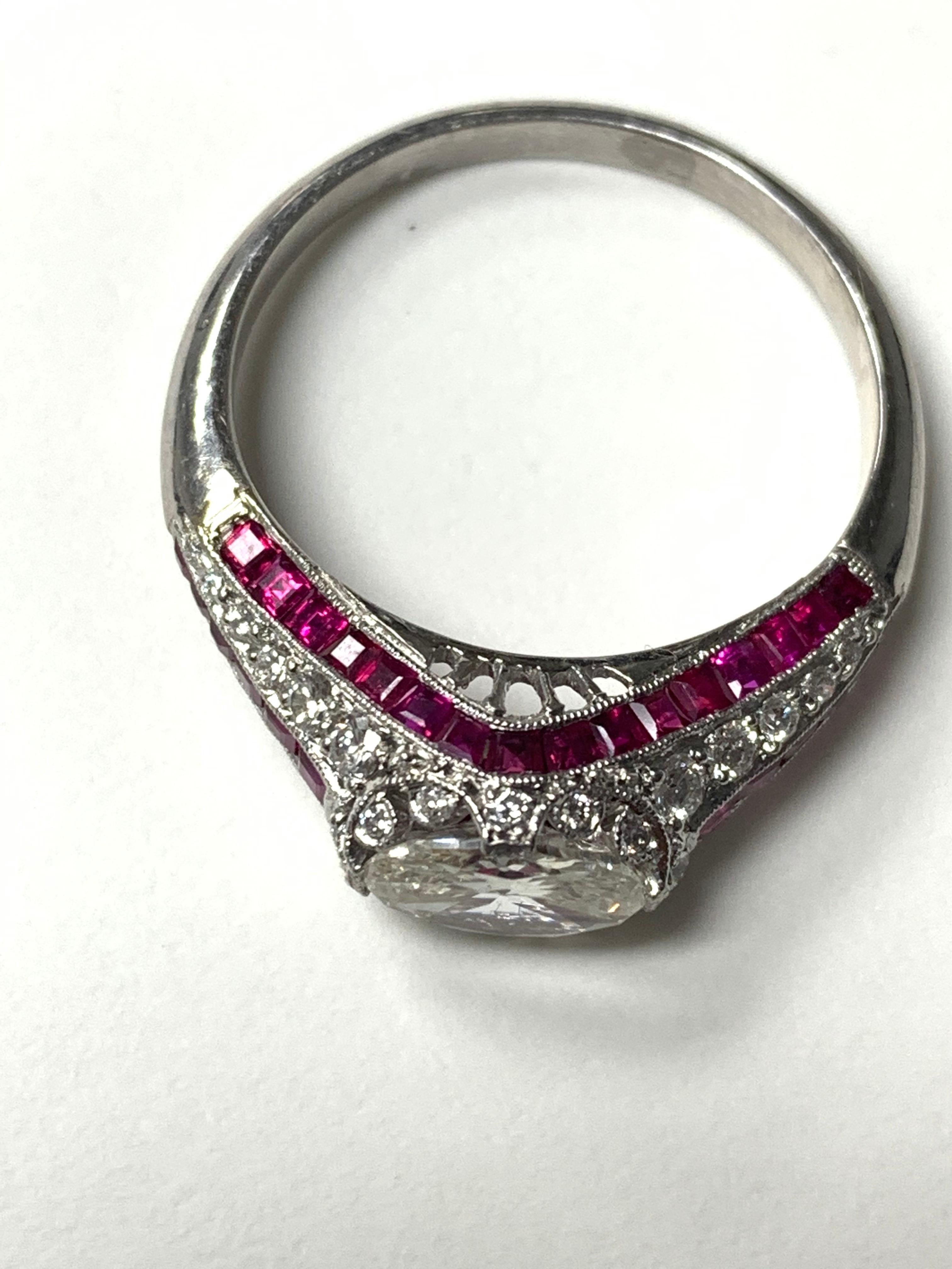 Oval Cut Ruby and Oval Step Cut Diamond Engagement Ring in Platinum For Sale