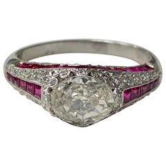 Ruby and Oval Step Cut Diamond Engagement Ring in Platinum