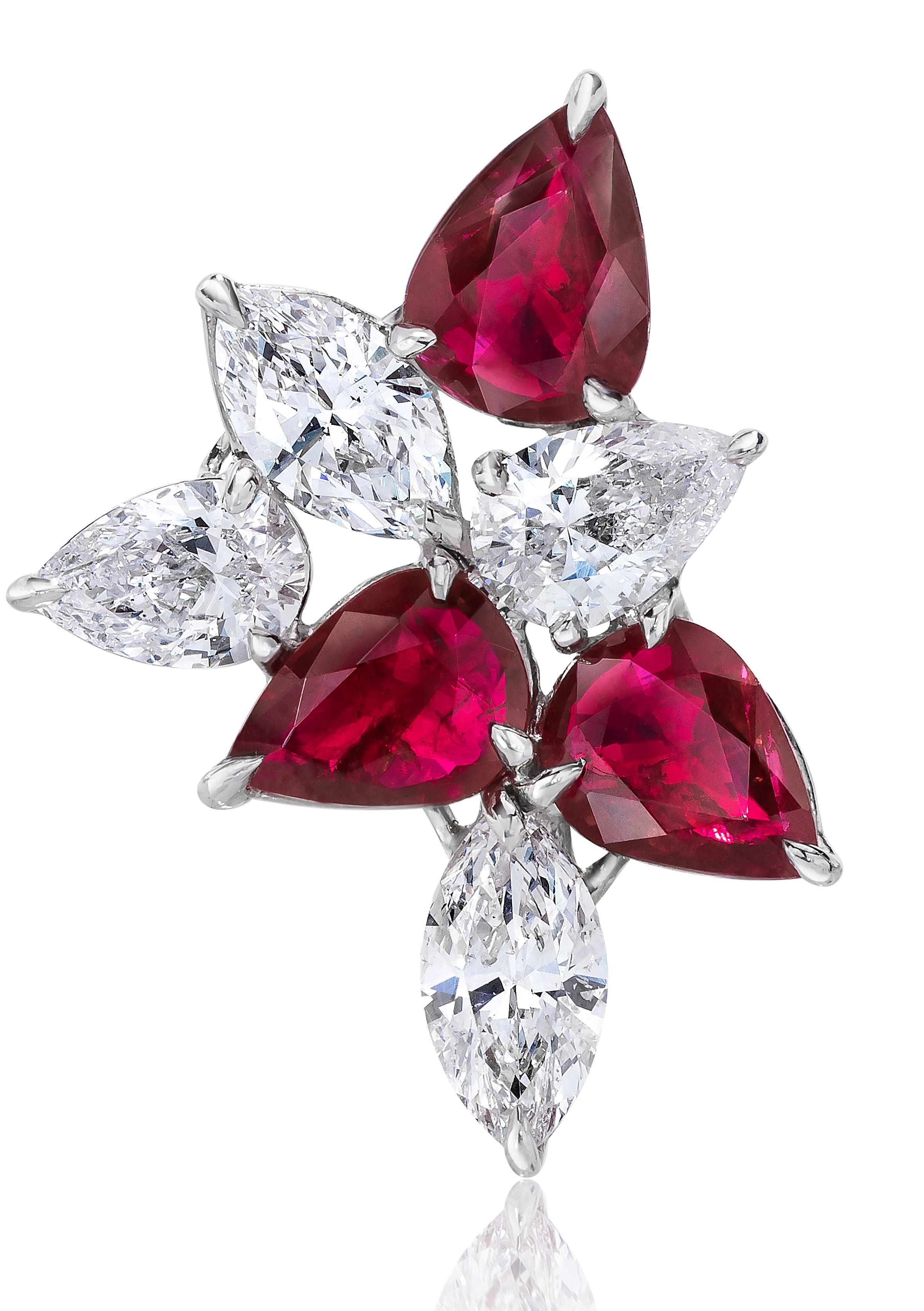 The Classic Cluster Earring. Redefined. Set with Rubies and Diamonds and Set in Platinum and 18 Karat White Gold.

Rubies totaling 5.34 Carats.
Diamonds Totaling 3.67 Carats.
9.01 Carats Total