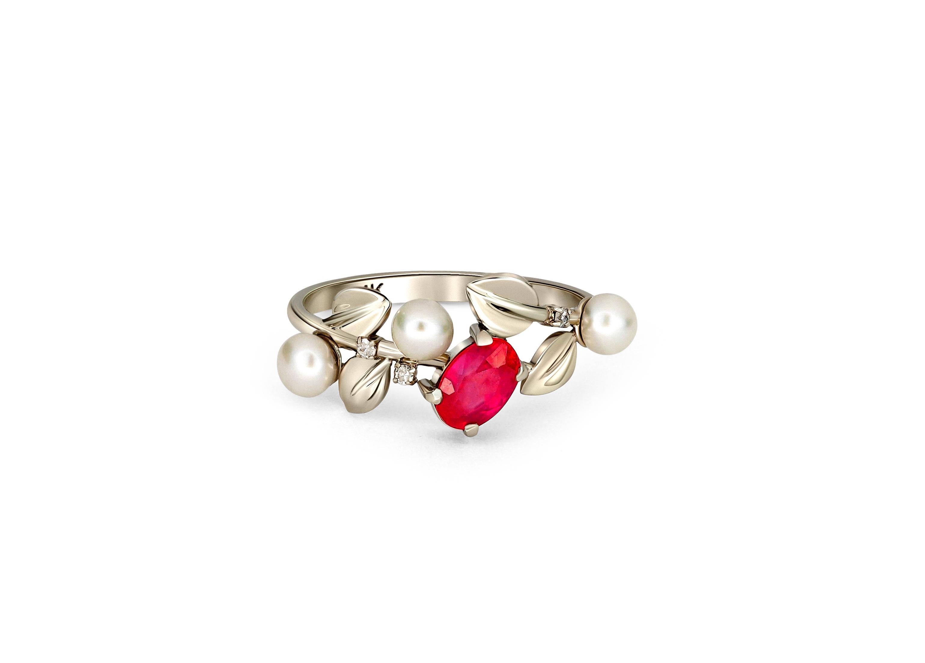 Ruby and pearl gold ring. 
Statement red ruby ring. Anniversary gift for her. Luxury dinner ruby ring. July birthstone ring. Flower gold ring.

Metal: 14k gold
Weight: 2.2 g. depends from size.

Central stone: ruby
Cut: Oval
Weight: aprx 0.7 ct.