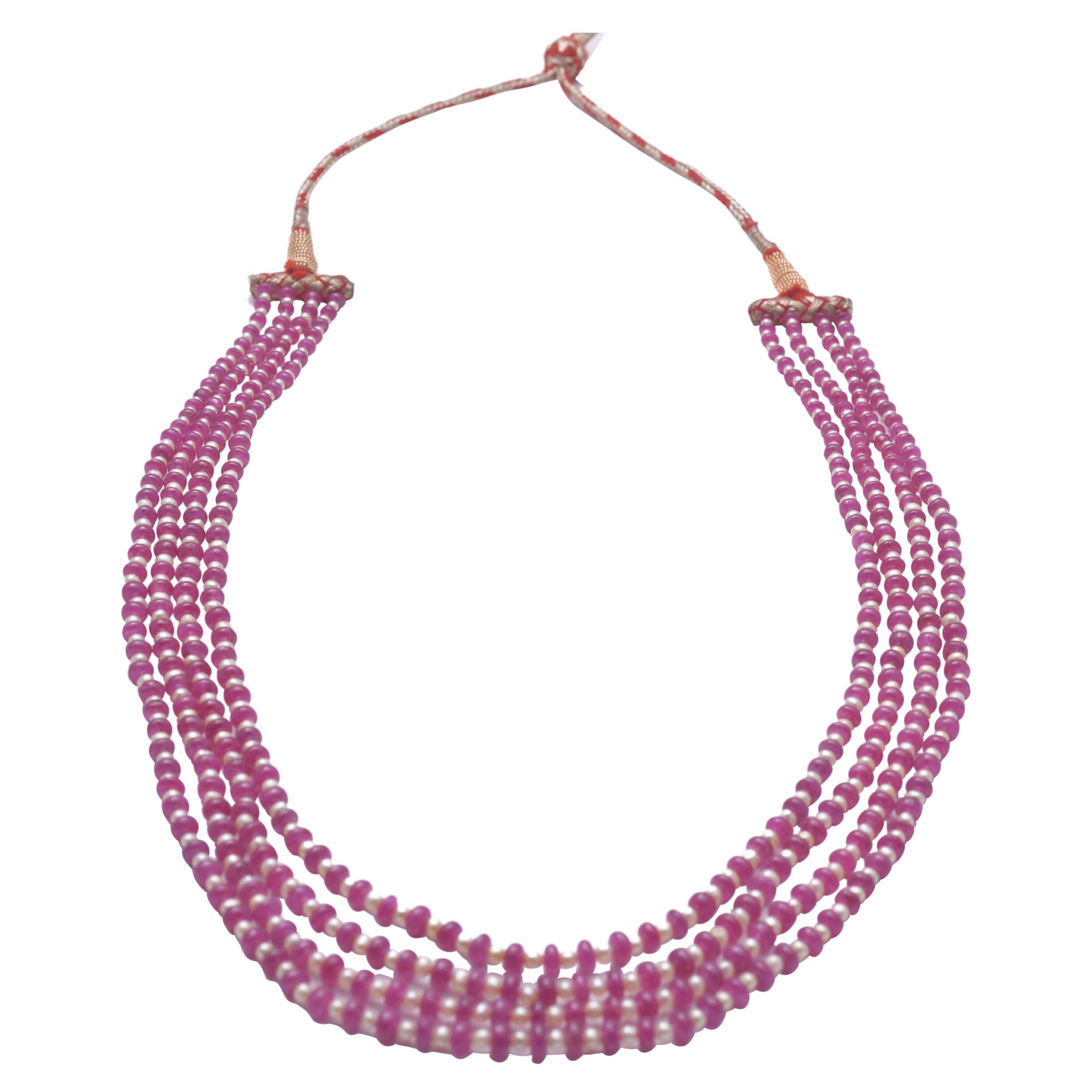 Collar de rubíes y perlas