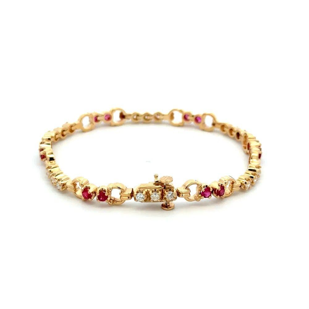 Simply Beautiful! Vintage Ruby and Diamond Bit Link Gold Bracelet. Hand set with 0.85tcw Rubies and Round Brilliant Cut Diamonds, weighing approx. 0.90tcw. Hand crafted in 14K Yellow Gold. Bracelet measures approx. 7 inches long. More Beautiful in