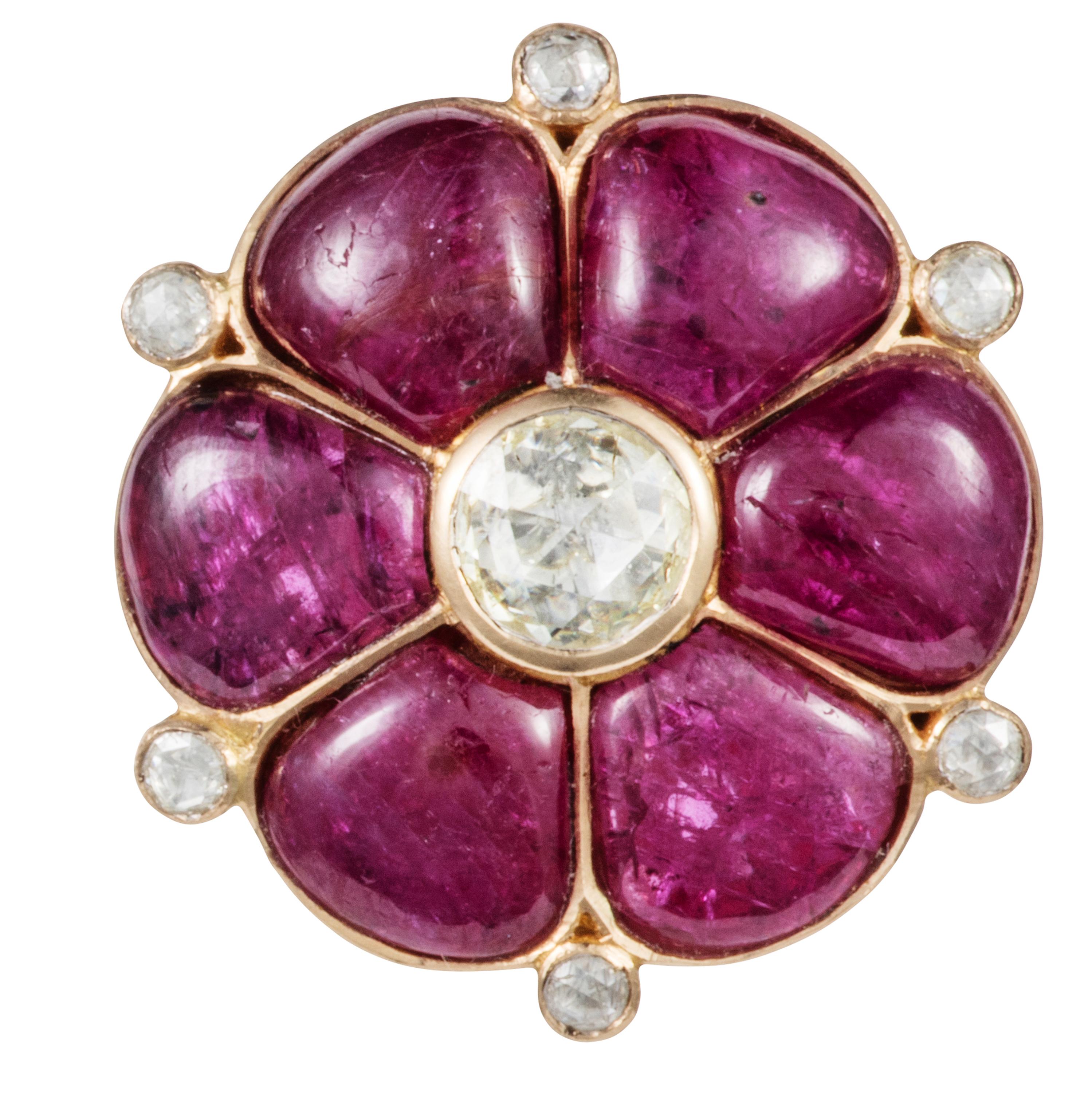 Gross weight: 14.150 grams 
Gold weight: 11.170 grams 
Diamond weight: 0.74 carats 
Ruby weight: 13.68 carats 

Cabochon rubies glow in their intricate Kundan 18kk gold foil setting interspersed with bright diamonds.  Inspired by the shape of an