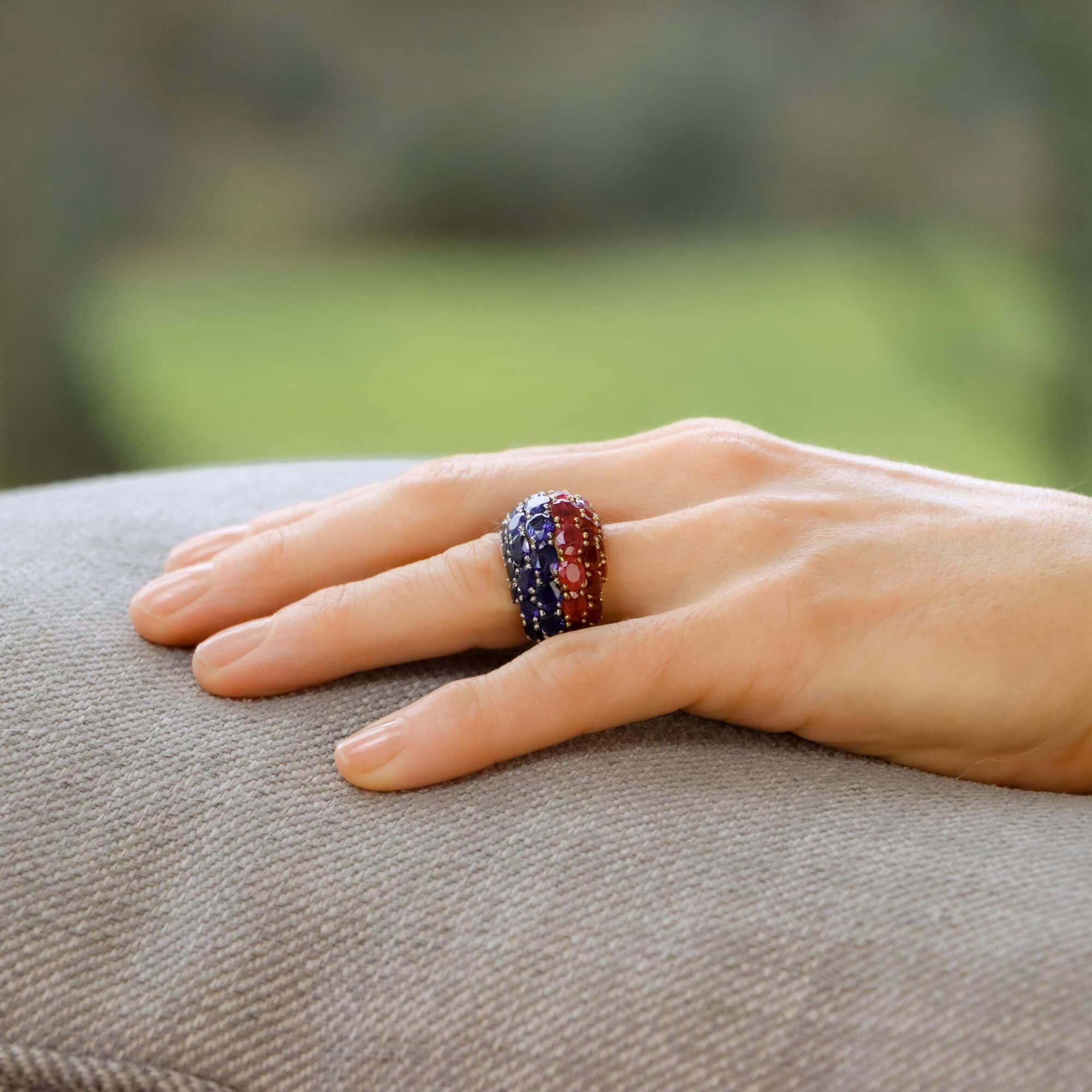 Oval Cut Ruby and Sapphire Bombe Ring Set in 18 Karat Yellow Gold and Platinum