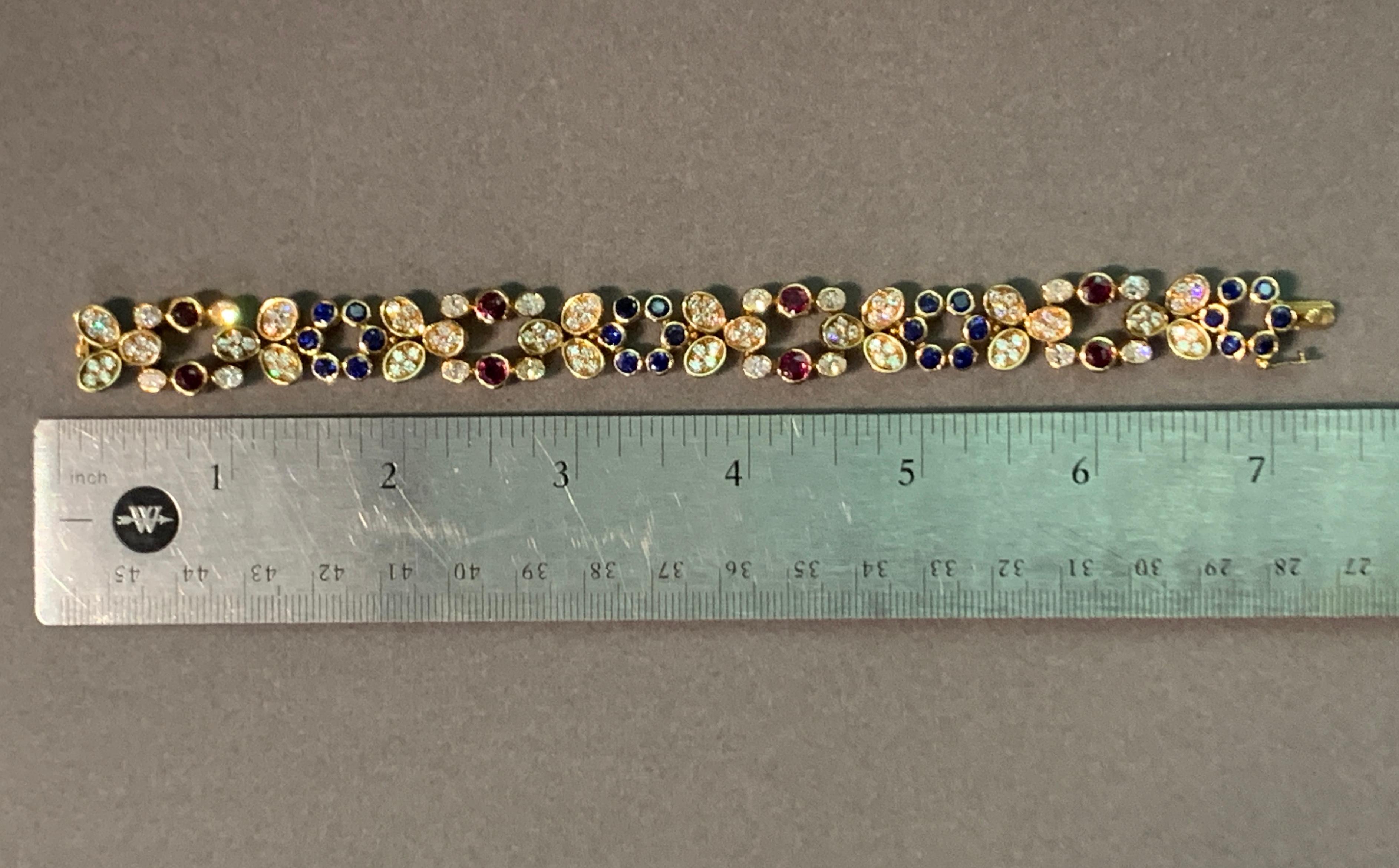 Ruby and Sapphire Floral Bracelet In Excellent Condition For Sale In New York, NY