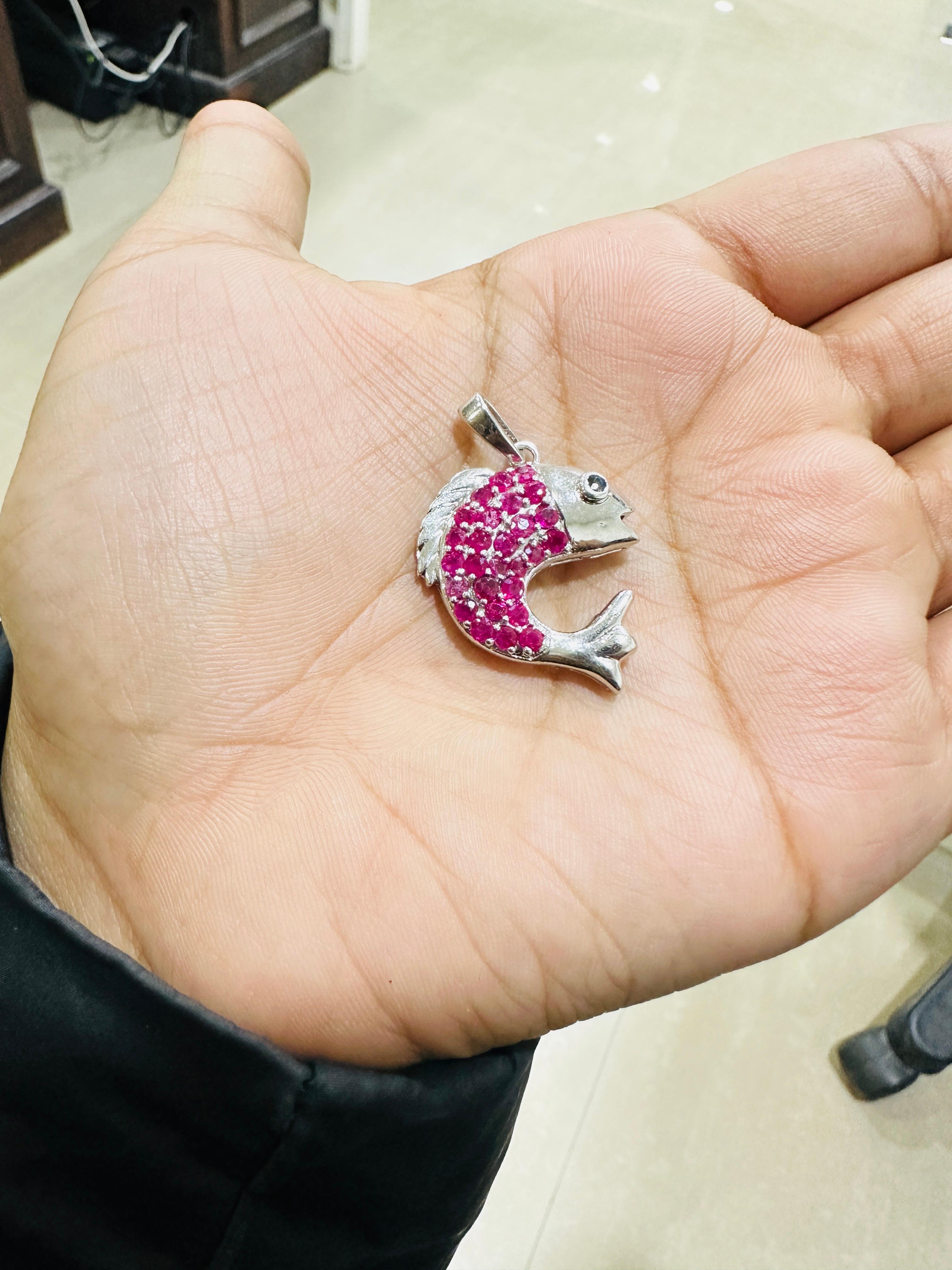 This Playful Dolphin Pendant Set in 925 Silver with Ruby and a Sapphire Eye for Gift  in sterling silver, a true piece of vintage elegance! This Antique Pendant features a stunning, genuine blue sapphire and ruby stone, delicately set in a