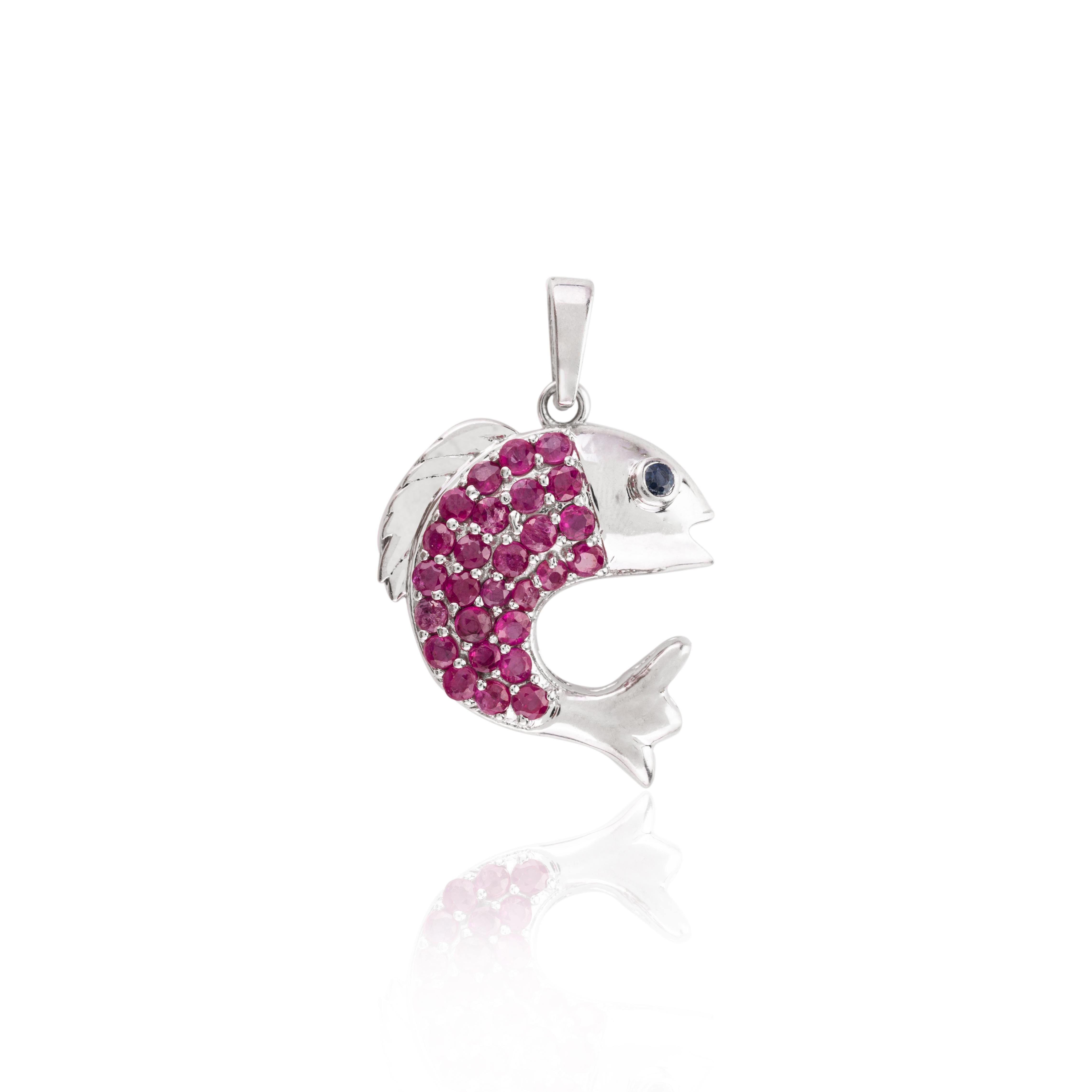 Modernist Playful Dolphin Pendant Set in 925 Silver with Ruby and a Sapphire Eye for Gift For Sale
