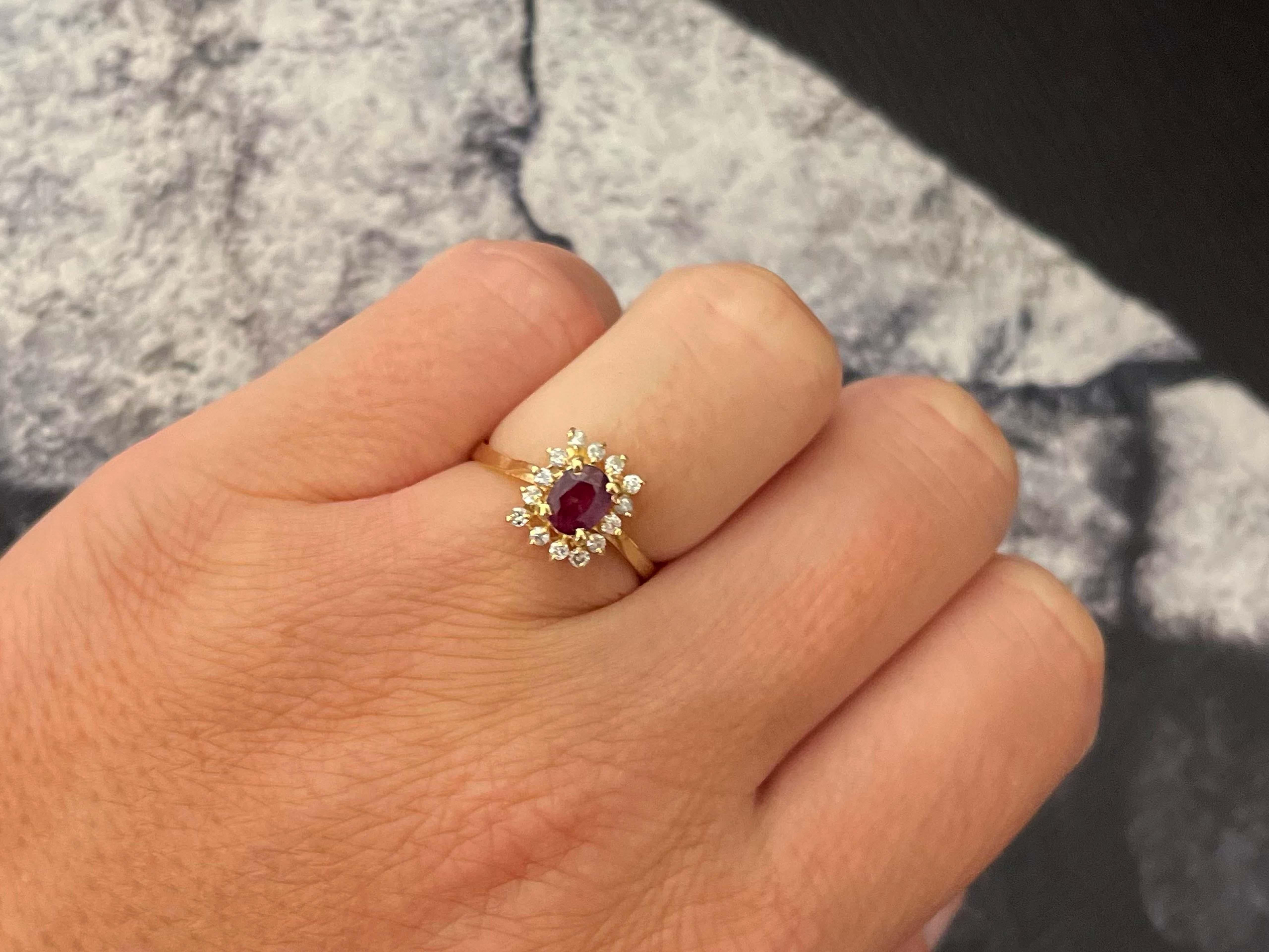Item Specifications:

Metal: 14K Yellow Gold

Style: Statement Ring

Ring Size: 6 (resizing available for a fee)

Total Weight: 2.2 Grams

Gemstone Specifications:

Gemstones: 1 red ruby

Ruby Carat Weight: 0.49 carats

Diamond Carat Weight: 0.14