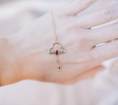 Ruby and tourmaline gold key necklace