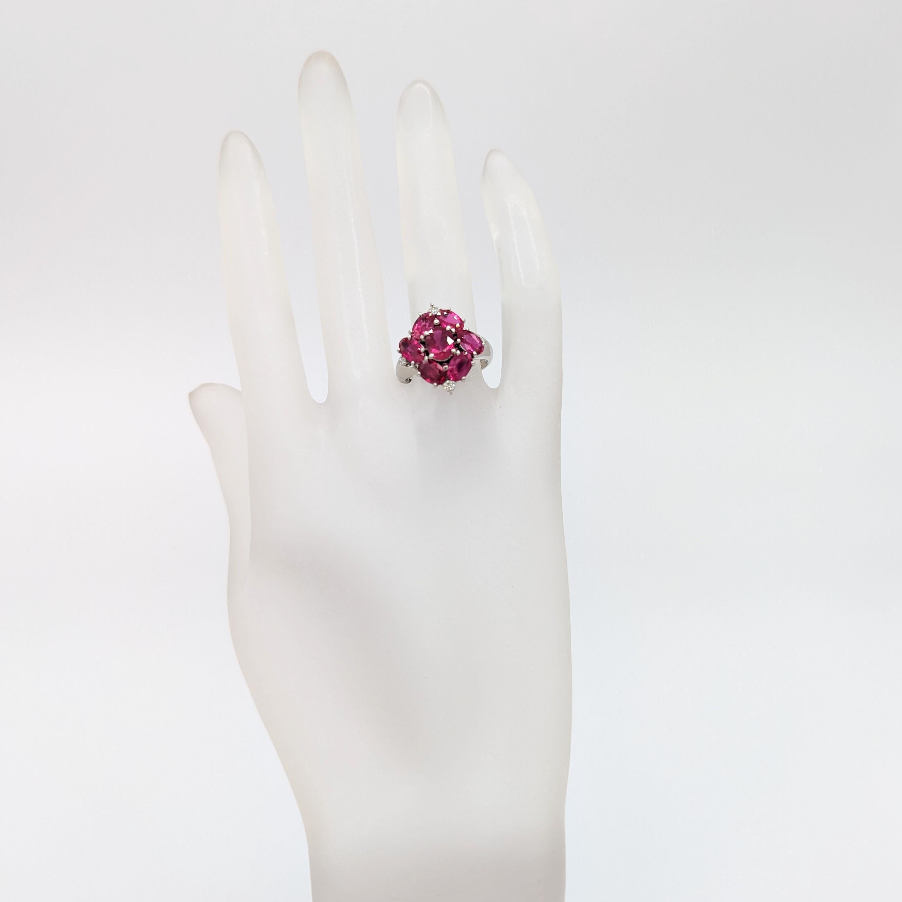 Oval Cut Ruby and White Diamond Cluster Ring in Platinum For Sale