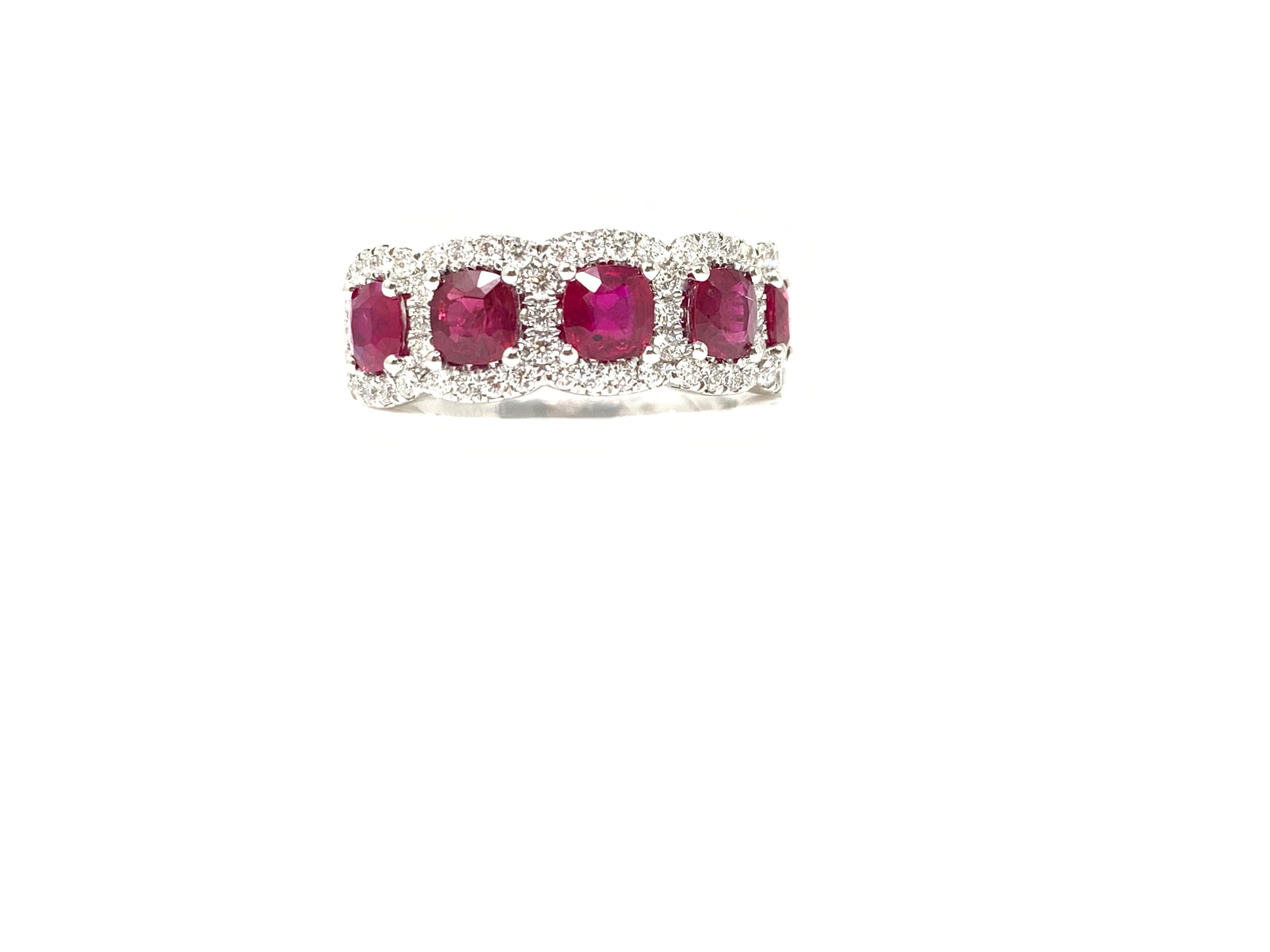Moguldiam Inc  ruby and diamond wedding band is beautifully hand made in 18k white gold.
The details are as follows : 
Ruby : 1.55 carat 
Diamond : 0.49 carat 
Metal : 18k white gold 
Ring size : 6 1/2 
