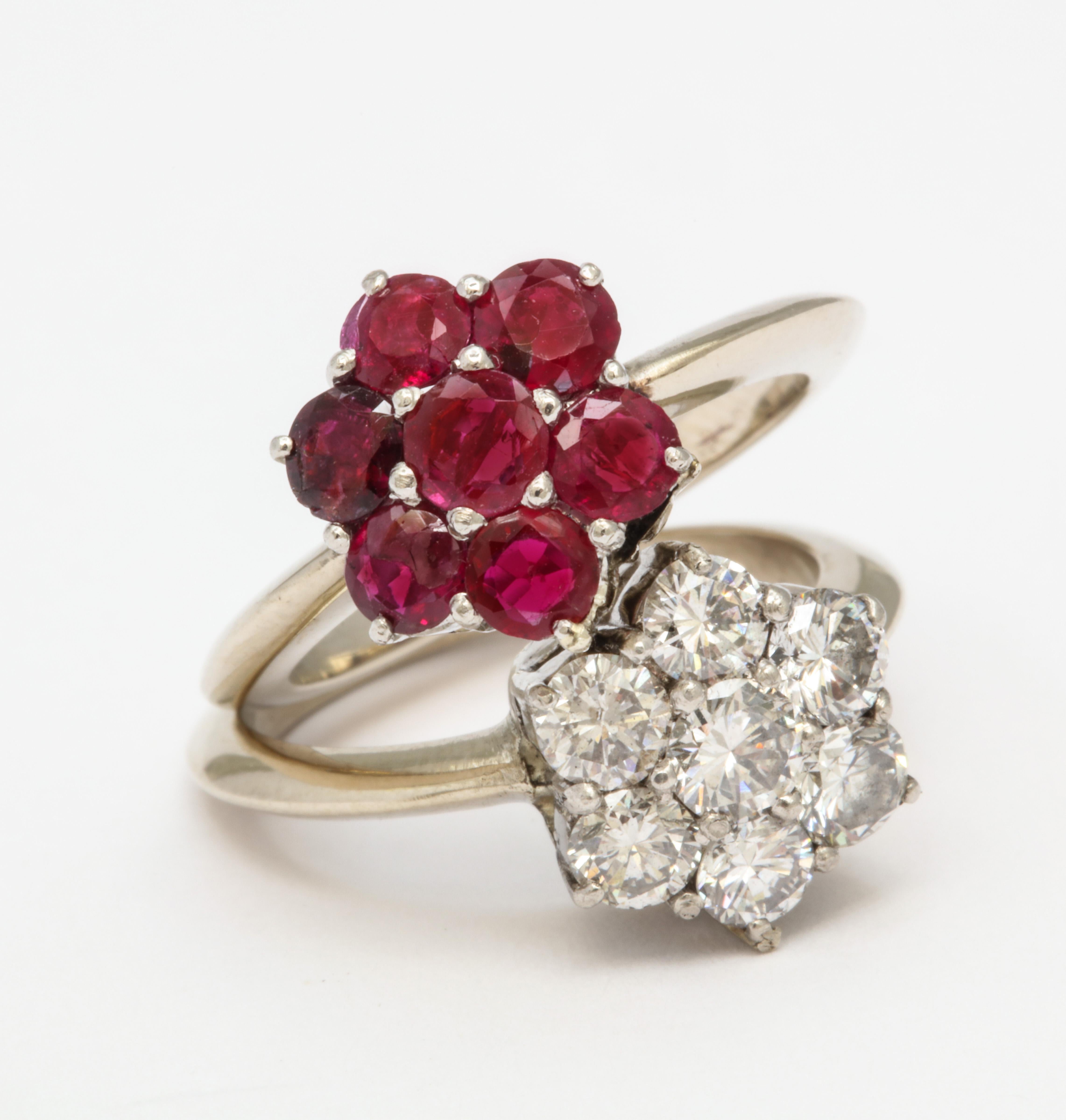 A beautiful group of 6 rubies surrounding a center stone set in 18 kt gold 