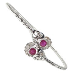 Ruby and White Round Brilliant Diamond Flexible Bangle in 18 Karat White Gold