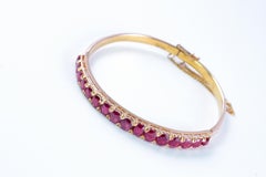 Ruby Bangle in 14 Karat Yellow Gold