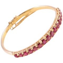 Ruby Bangle in 14 Karat Yellow Gold