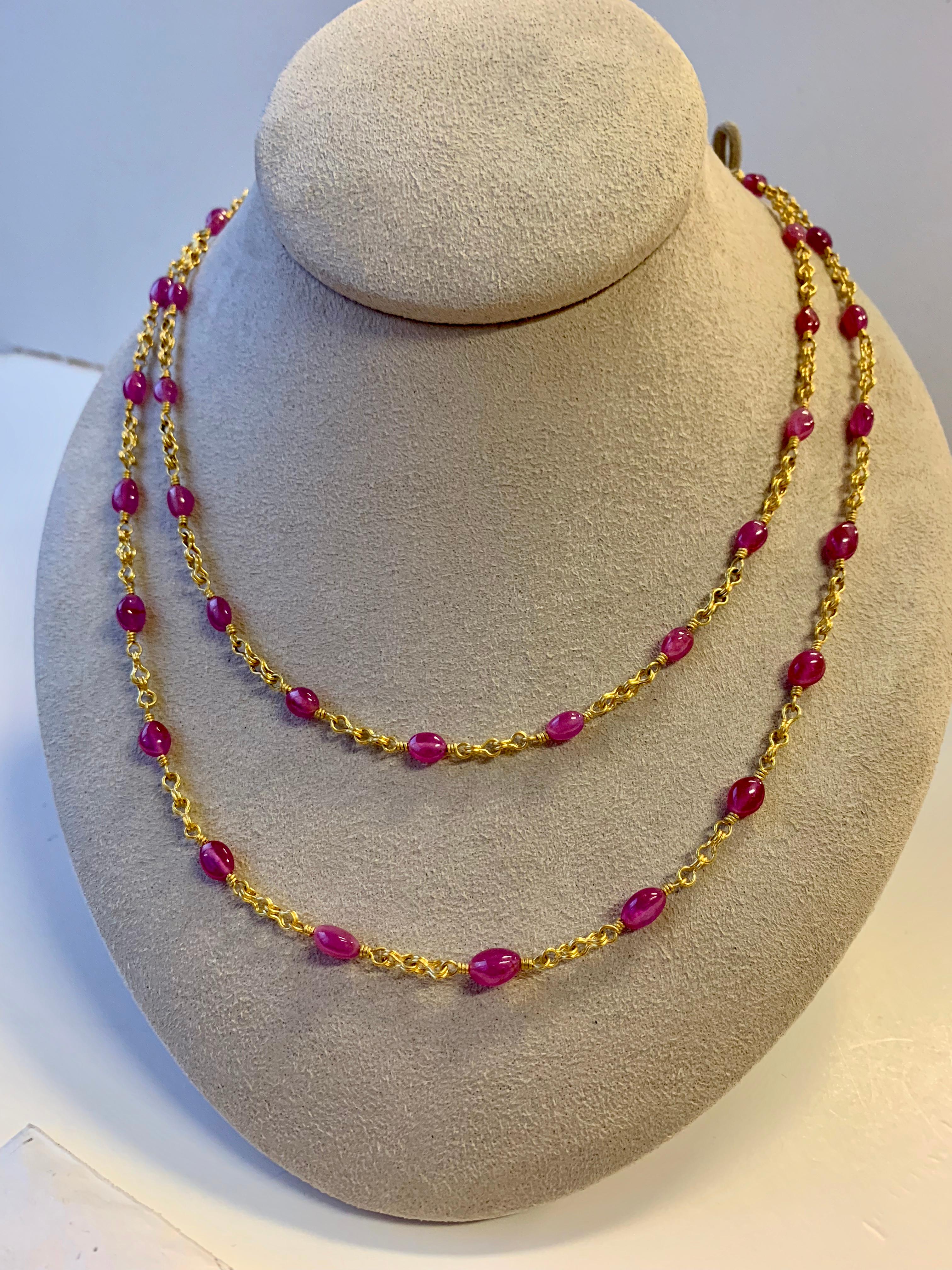 A stone that has been referenced since biblical times, rubies are considered one of the four cardinal gems. In ancient times, ruby stones were kept under a building foundation, to strengthen its structure. 
Smooth oval Ruby beaded necklace in 22