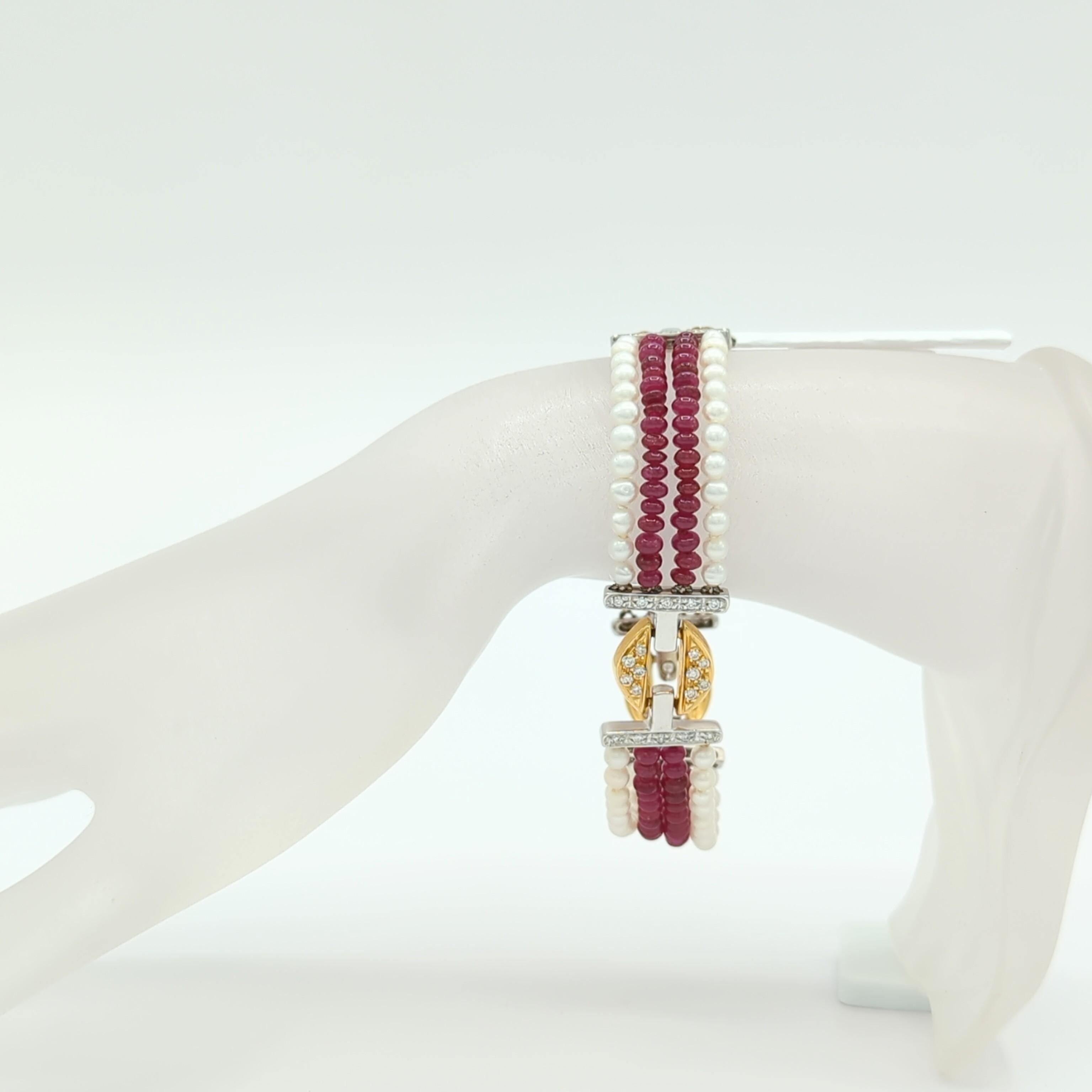 Beautiful 20.00 ct. of bright red ruby beads with 1.20 ct. of good quality, white, and bright diamond rounds.  Handmade in 18k yellow and white gold.  Length is 7.25