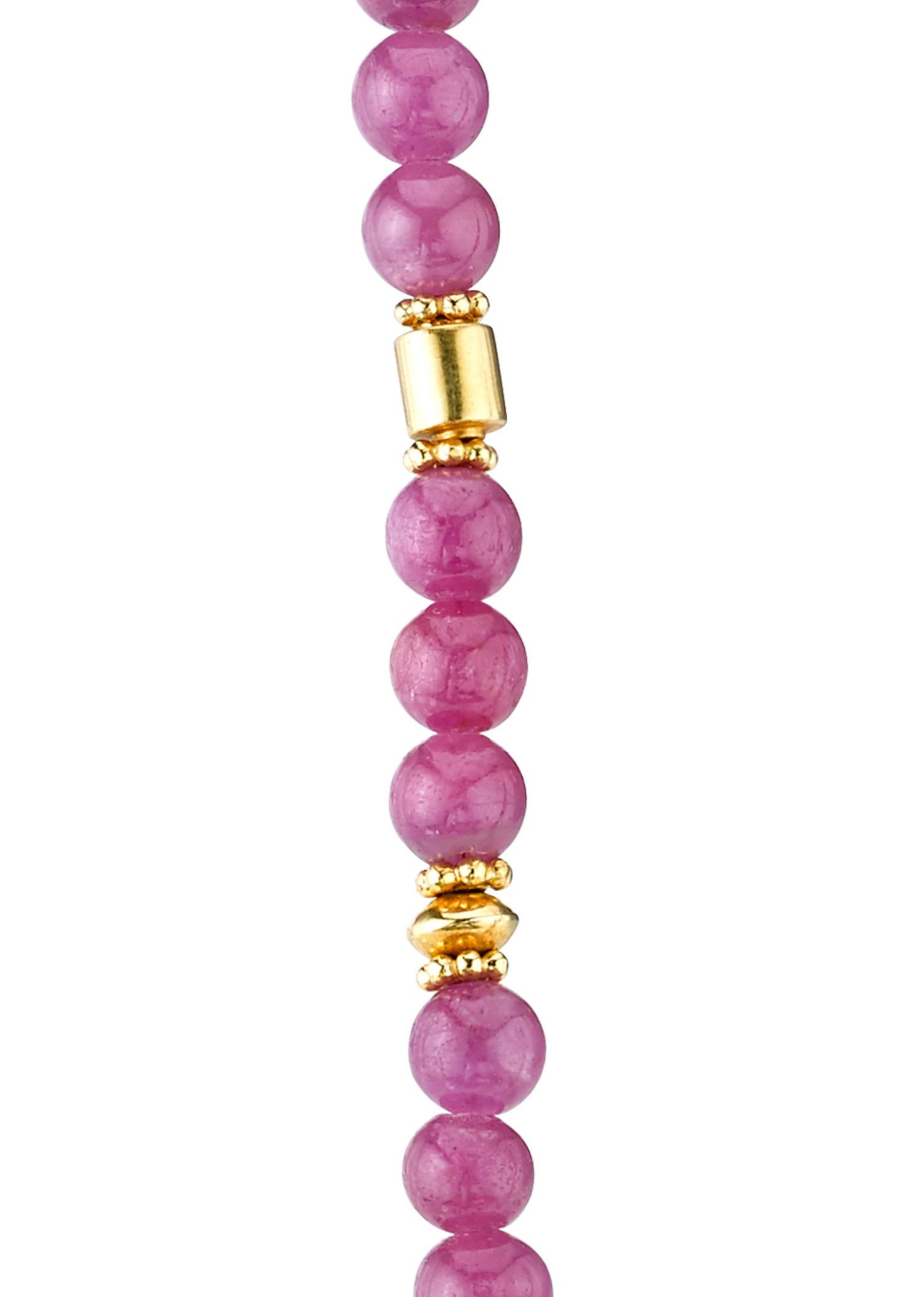 The beauty of these ruby beads cannot be denied. The 5 millimeter ruby beads are incredibly vibrant and produce strong energy to help you get though your day. The 22K yellow gold spacers elevate this piece to new heights really bringing these