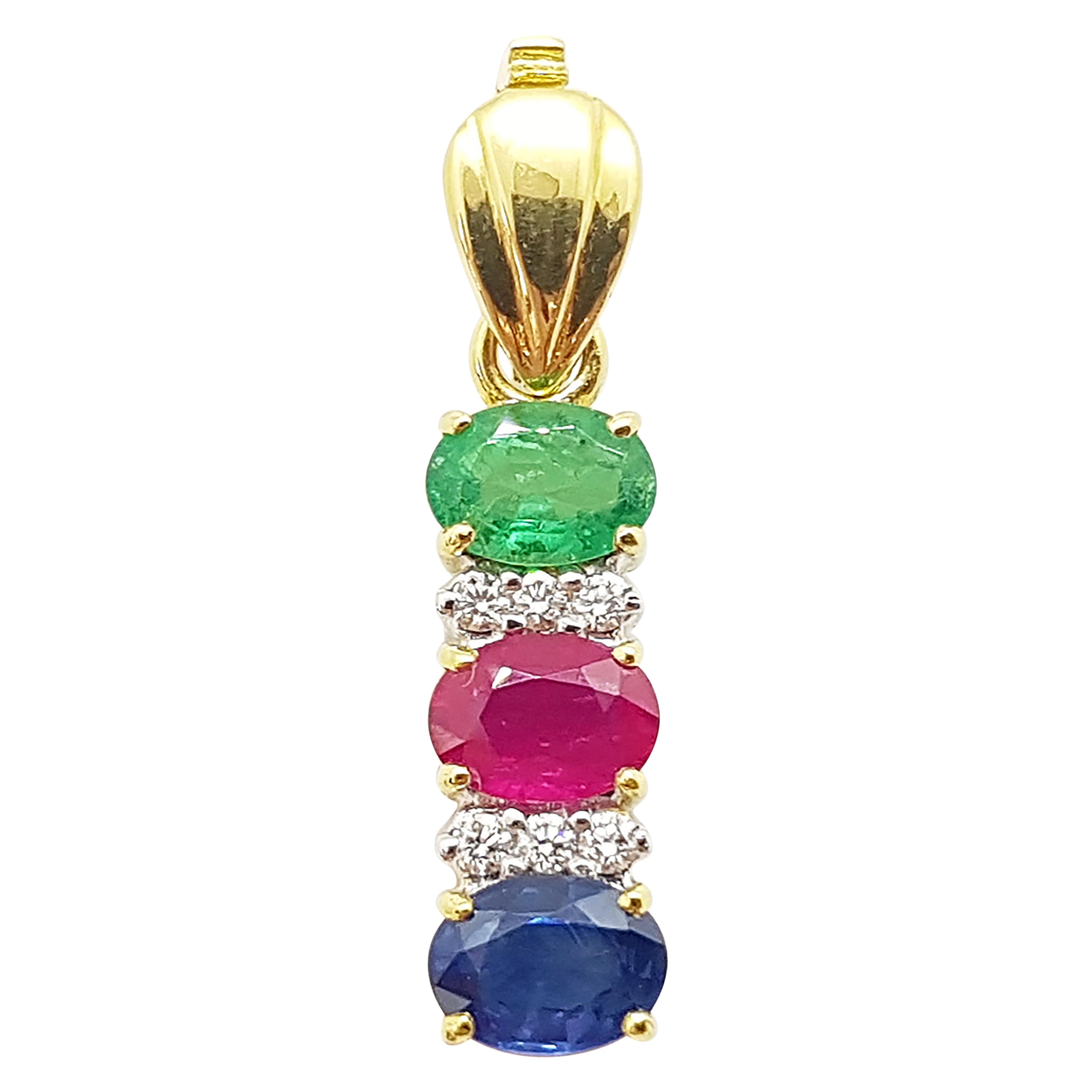Ciondolo con rubino, zaffiro blu e smeraldo con diamante in oro 18 carati