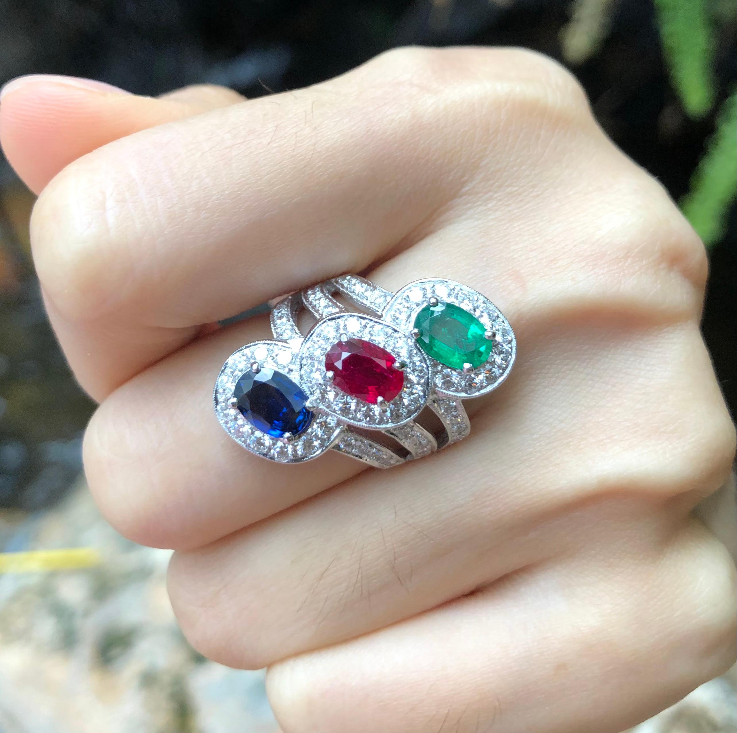 Contemporary Ruby, Blue Sapphire, Emerald and Diamond Ring set in 18 Karat White Gold Setting For Sale