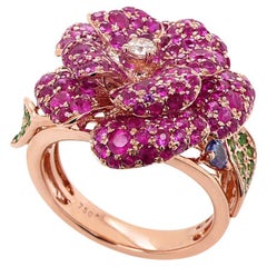 Anello con rubino, zaffiro blu e pietra multipla The Lilly Flower in oro rosa 18 carati