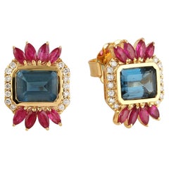 Boucles d'oreilles en or 14 carats avec topaze bleue rubis et diamant