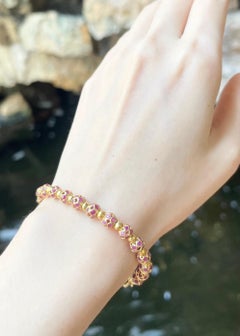 Ruby Bracelet set in 18K Gold Settings