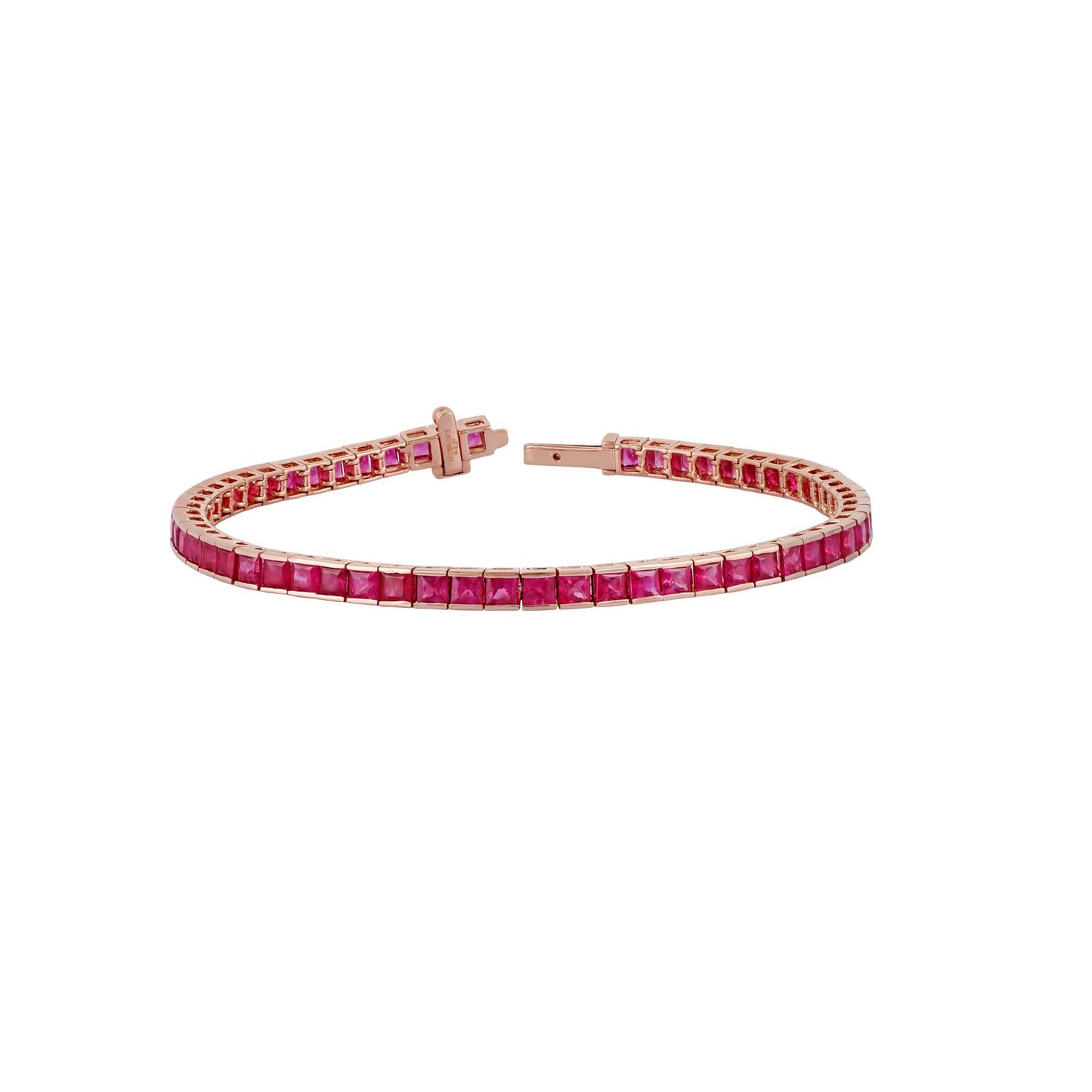 This is an elegant ruby bracelet features 58 pieces of princess cut rubies 9.27 carat in the channel setting, this bracelet entirely made in 18 karat rose gold weight 10.85 grams, this is a classic tennis bracelet.