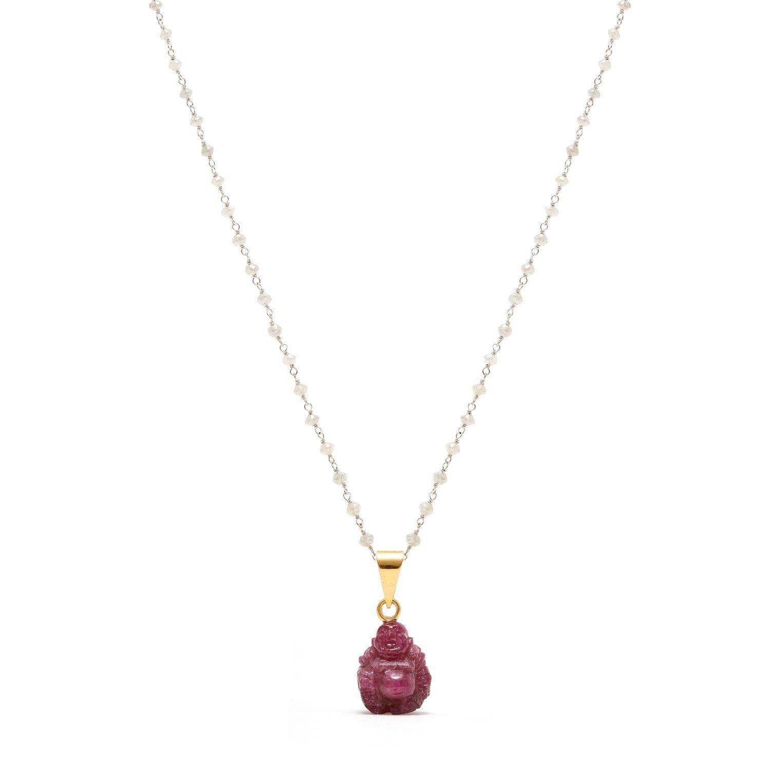 A ruby cabochon Buddha with an 18 karat gold jump ring suspended on a white diamond chain.

- Ruby karat weight is 22.05 karats 
- White diamond beads and 18 karat gold chain length 18 inches