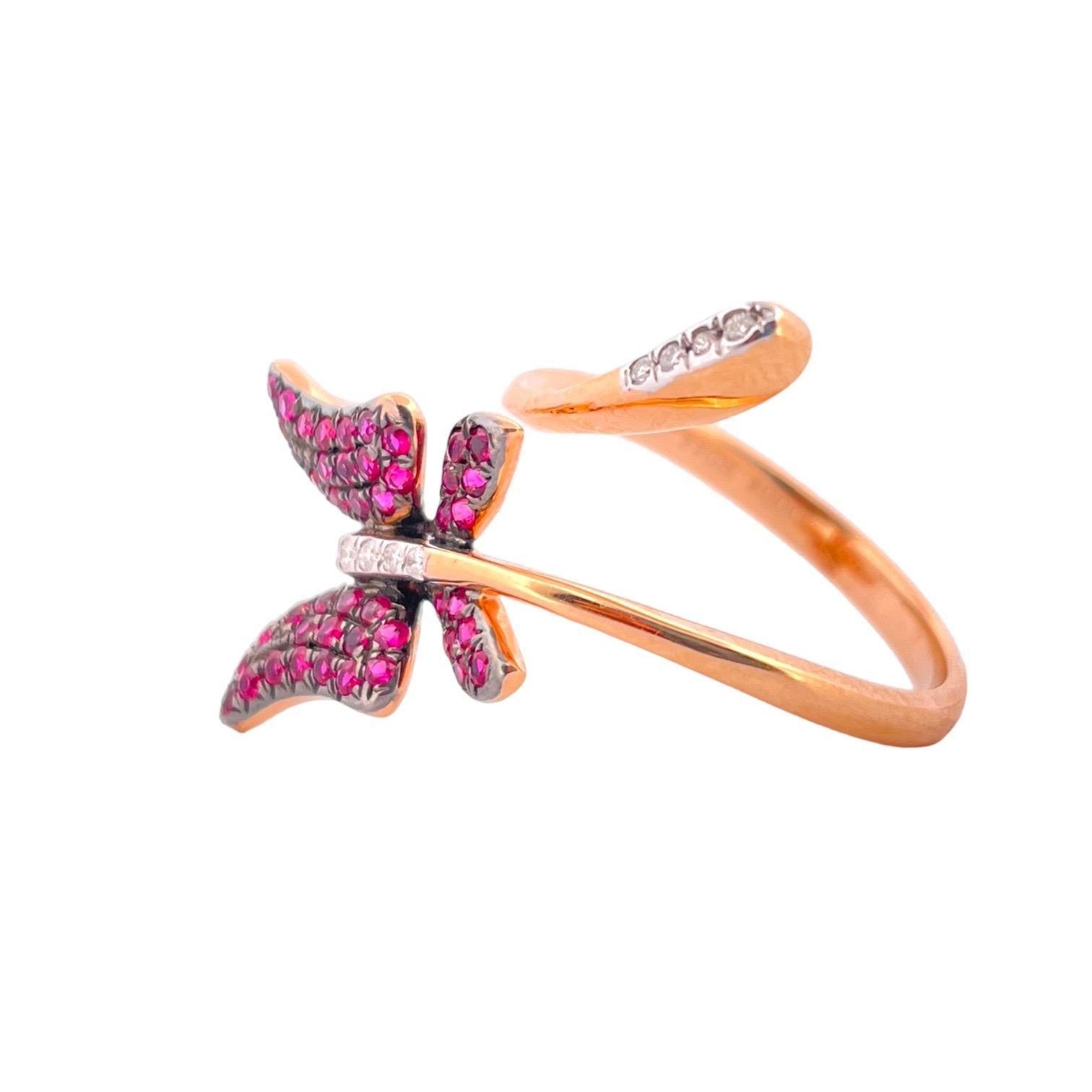 Embrace the enchantment of our Ruby Butterfly Diamond Ring, a stunning piece of jewelry artistry. This exquisite ring features a delicate butterfly design adorned with a vivid 0.48 carat total carat weight (TCW) of ruby gemstones, all elegantly set