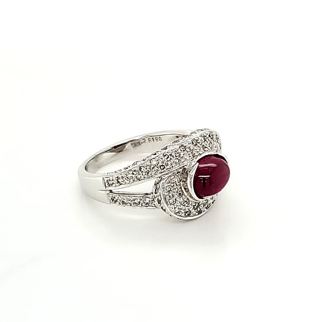 Ruby Cabochon And Diamond Ring:

An Intense Red Cabochon Ruby weighing 1.98 carat, with embellishment of White Diamonds on the shank weighing 0.63 carat. A simple design coupled with the fiery look of the Ruby makes the ring look elegant and