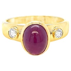 Ruby Cabochon and Round Diamond 3 Stone Ring in Yellow Gold
