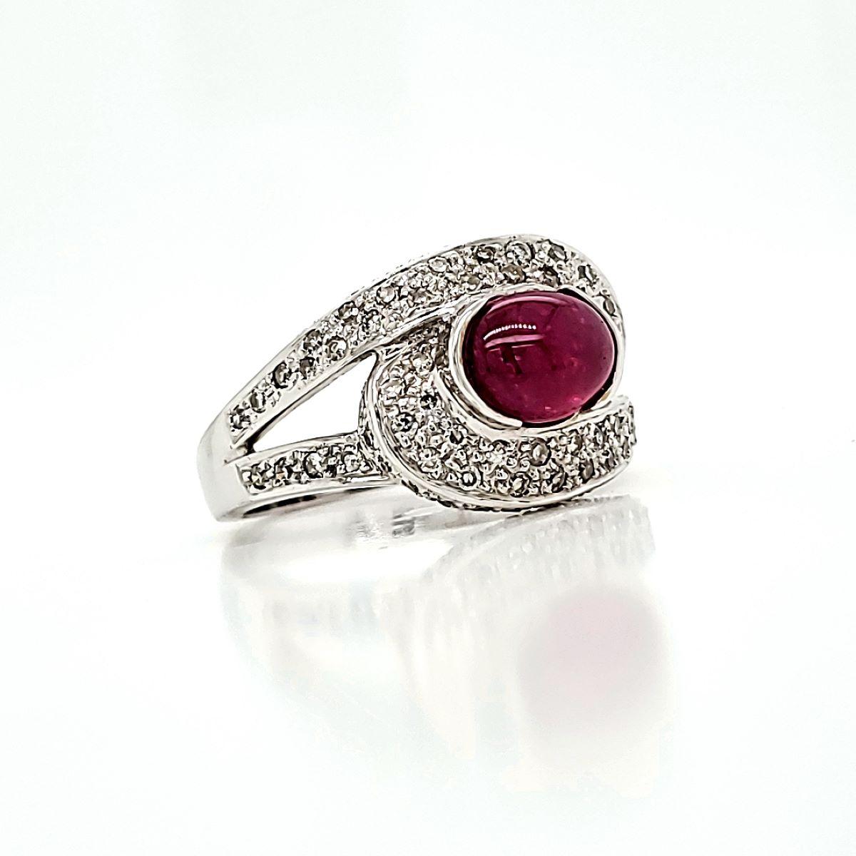 Contemporary Ruby Cabochon Cts 1.75 and Diamond Cts 0.63 Engagement Ring For Sale