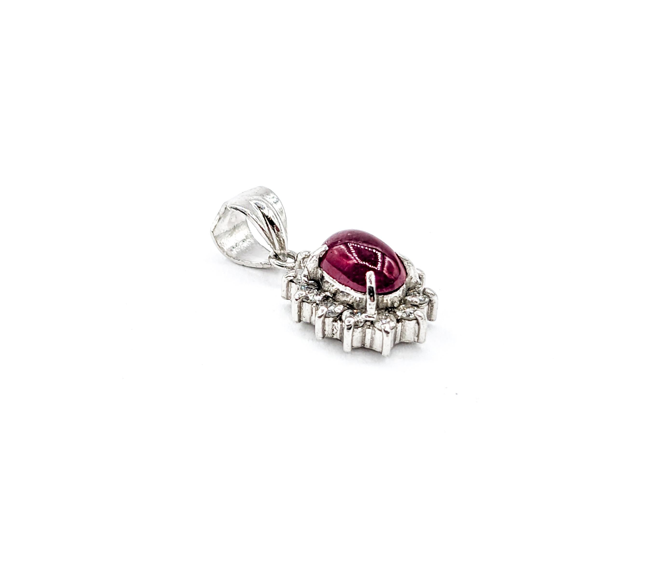 Ruby Cabochon & Diamond Platinum Pendant

Introducing a piece of timeless elegance, this exquisite pendant, meticulously crafted from 900pt platinum, a metal known for its rarity and luxurious appeal. This piece is a beacon of fine craftsmanship,