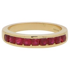 Ruby Channel Set Half Eternity Ring in 18k Yellow Gold