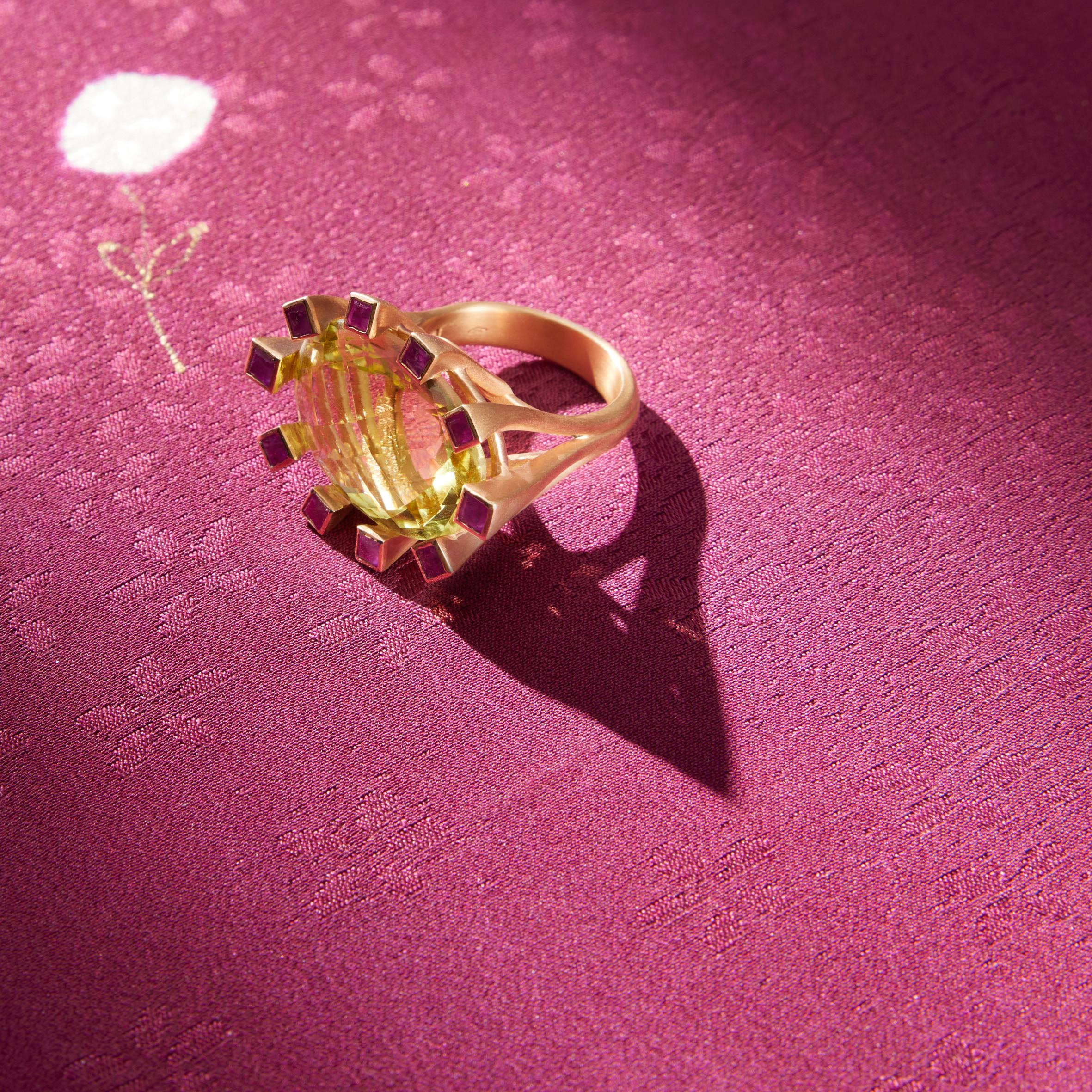 Rose Gold 21g magnificent citrine 12cts surrounded by ruby princess cut.
All Giulia Colussi jewelry is new and has never been previously owned or worn. Each item will arrive at your door beautifully gift wrapped in our boxes, put inside an elegant