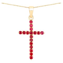 Collier pendentif croix de rubis en or jaune 14 carats