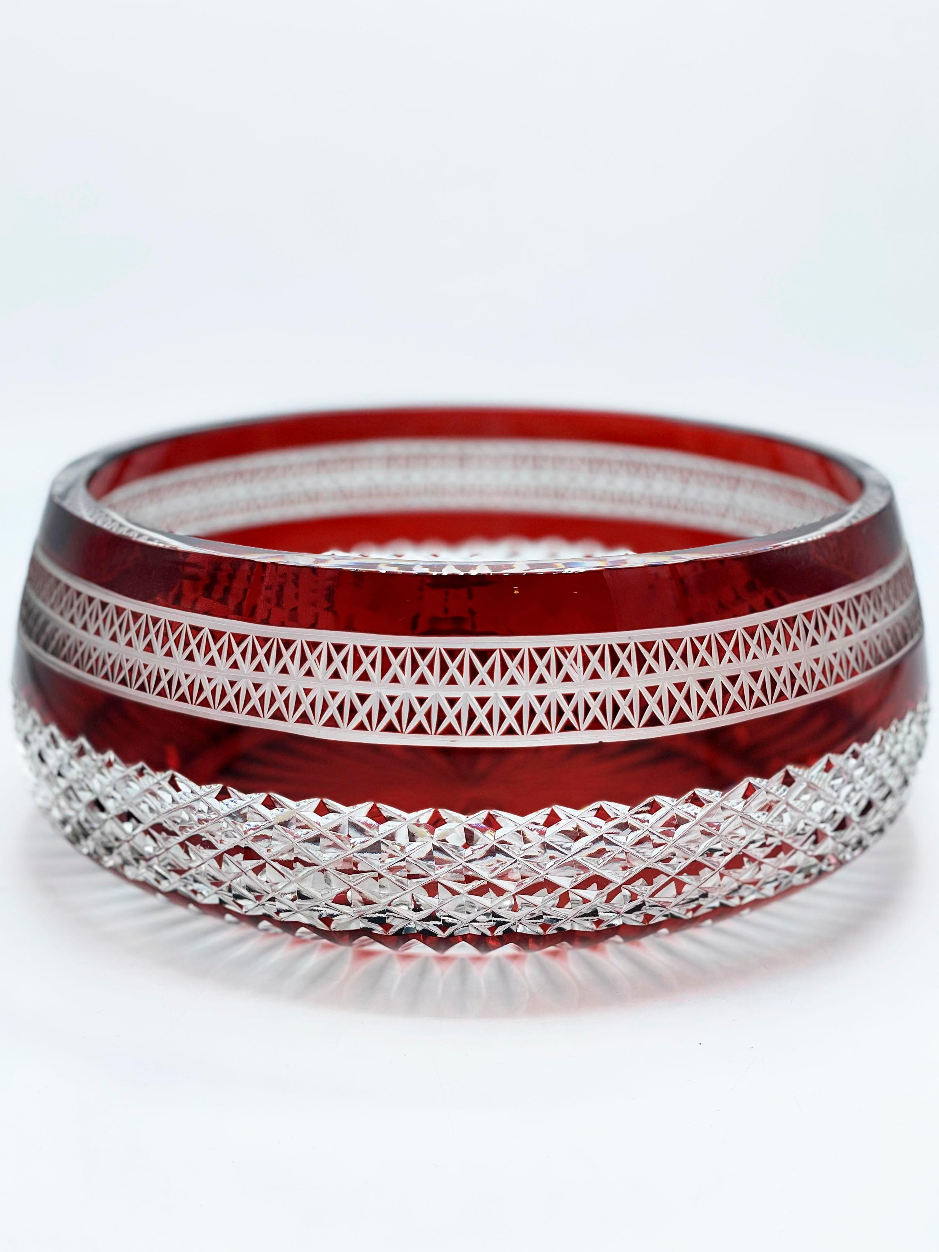 Ruby cut glass carved crystal bowl circa 1960s 
Blow ruby cut glass with beautifull carved details in geometric patterns perfect as a centerpiece, fruit bowl or planter.
Excellent conditions! without retorations and imperfections!