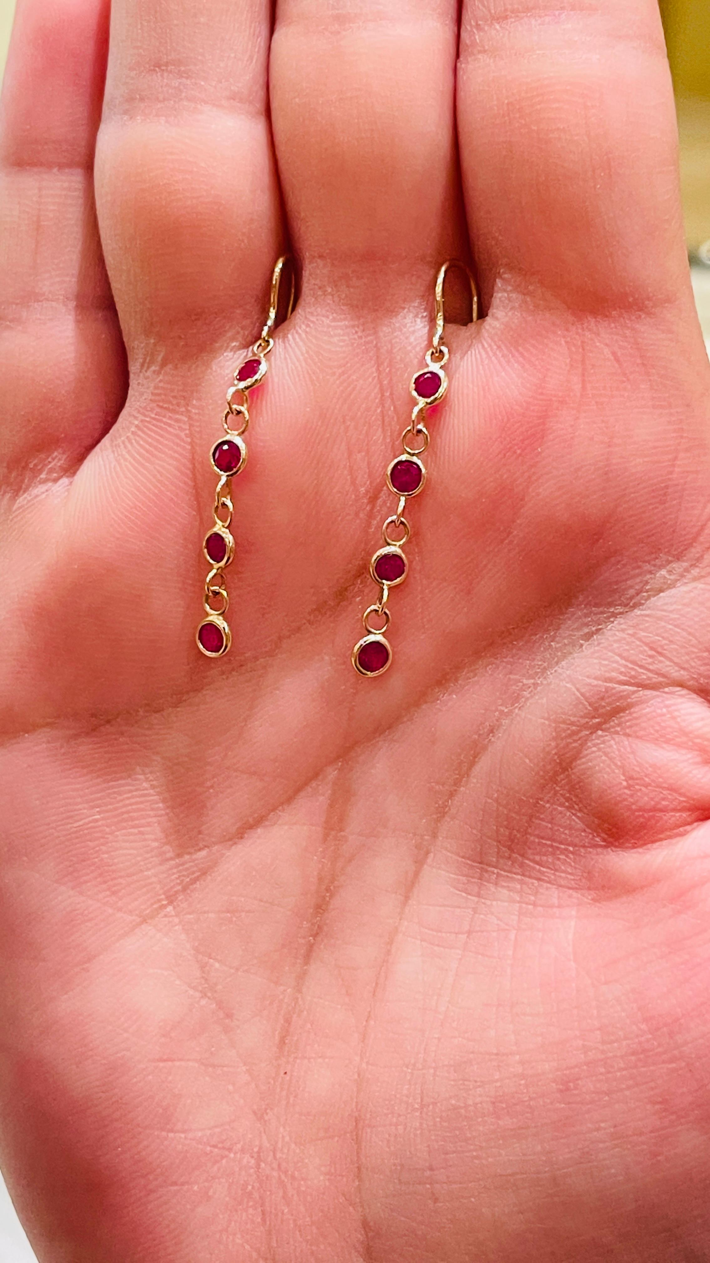 Modern Ruby Dangle Earrings in 18 Karat Yellow Gold For Sale