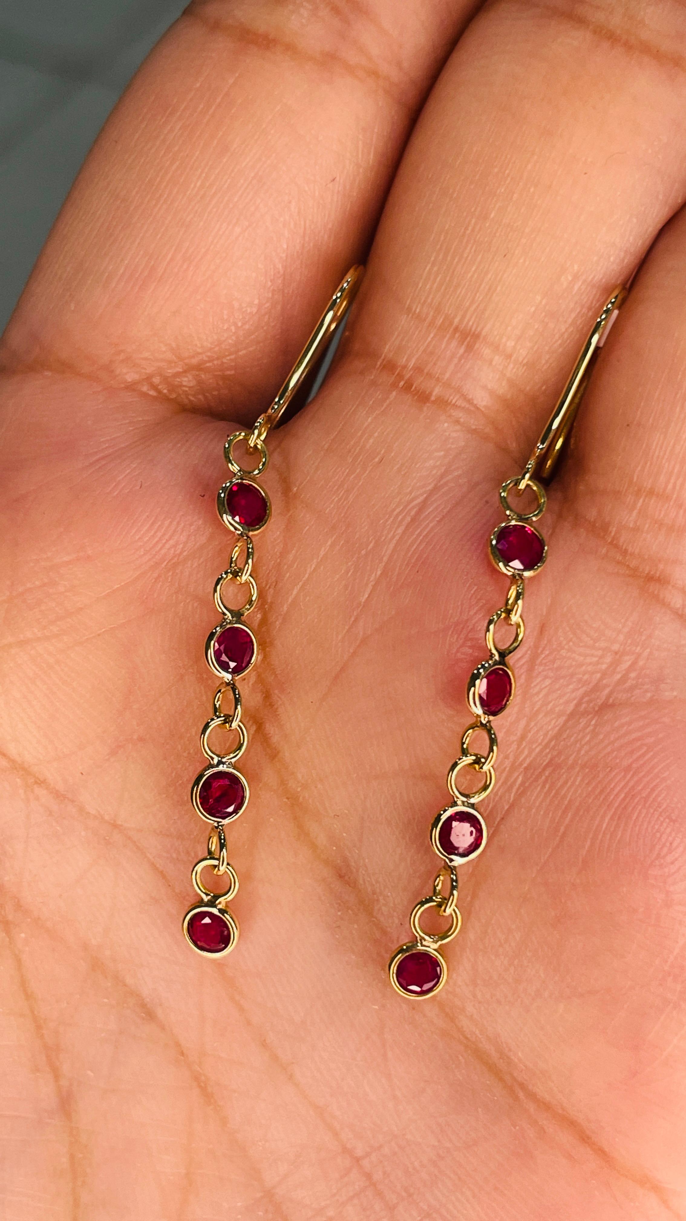 Women's Ruby Dangle Earrings in 18 Karat Yellow Gold