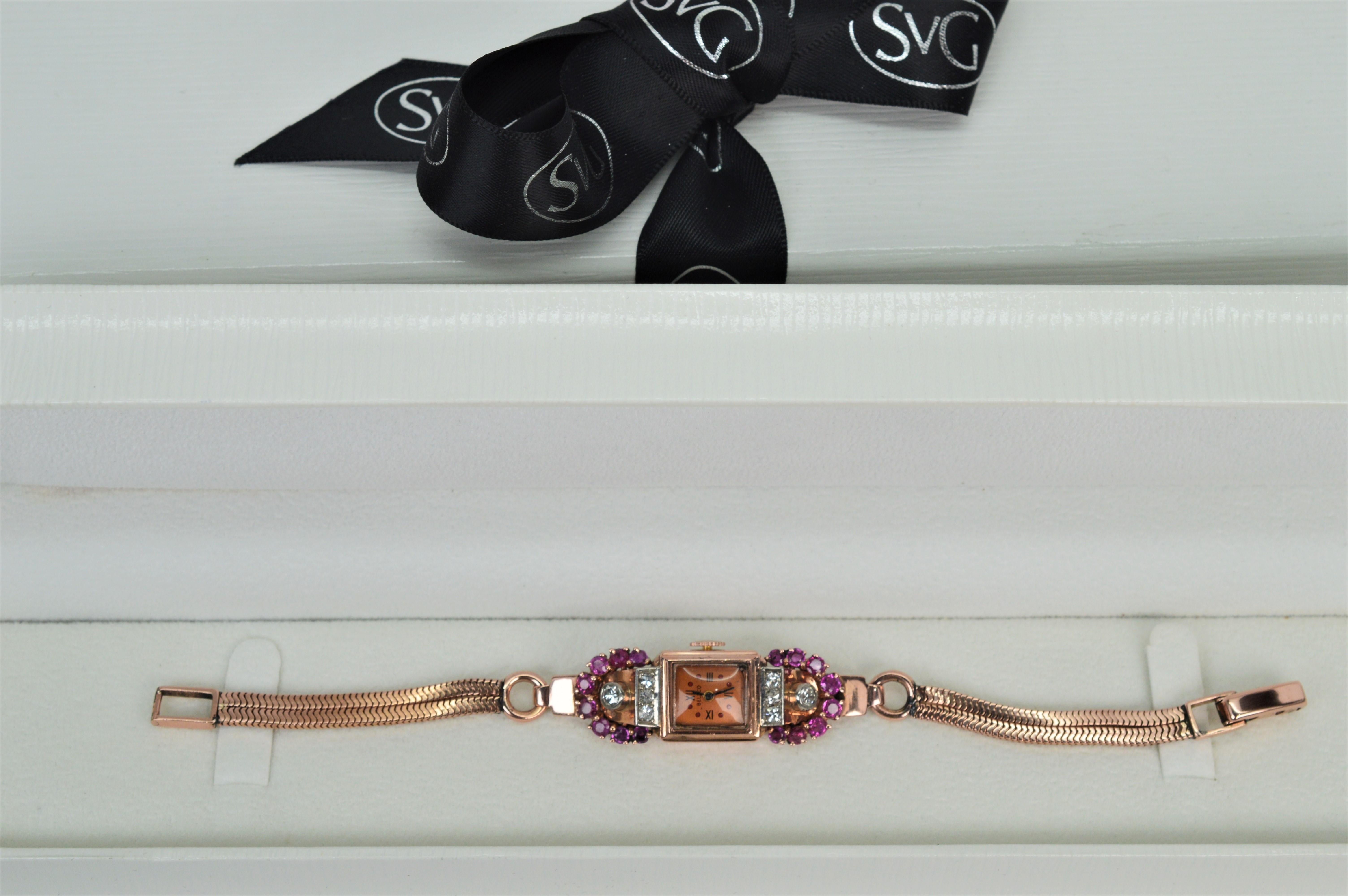 Montre-bracelet art déco en or rose 14 carats avec rubis et diamants en vente 8