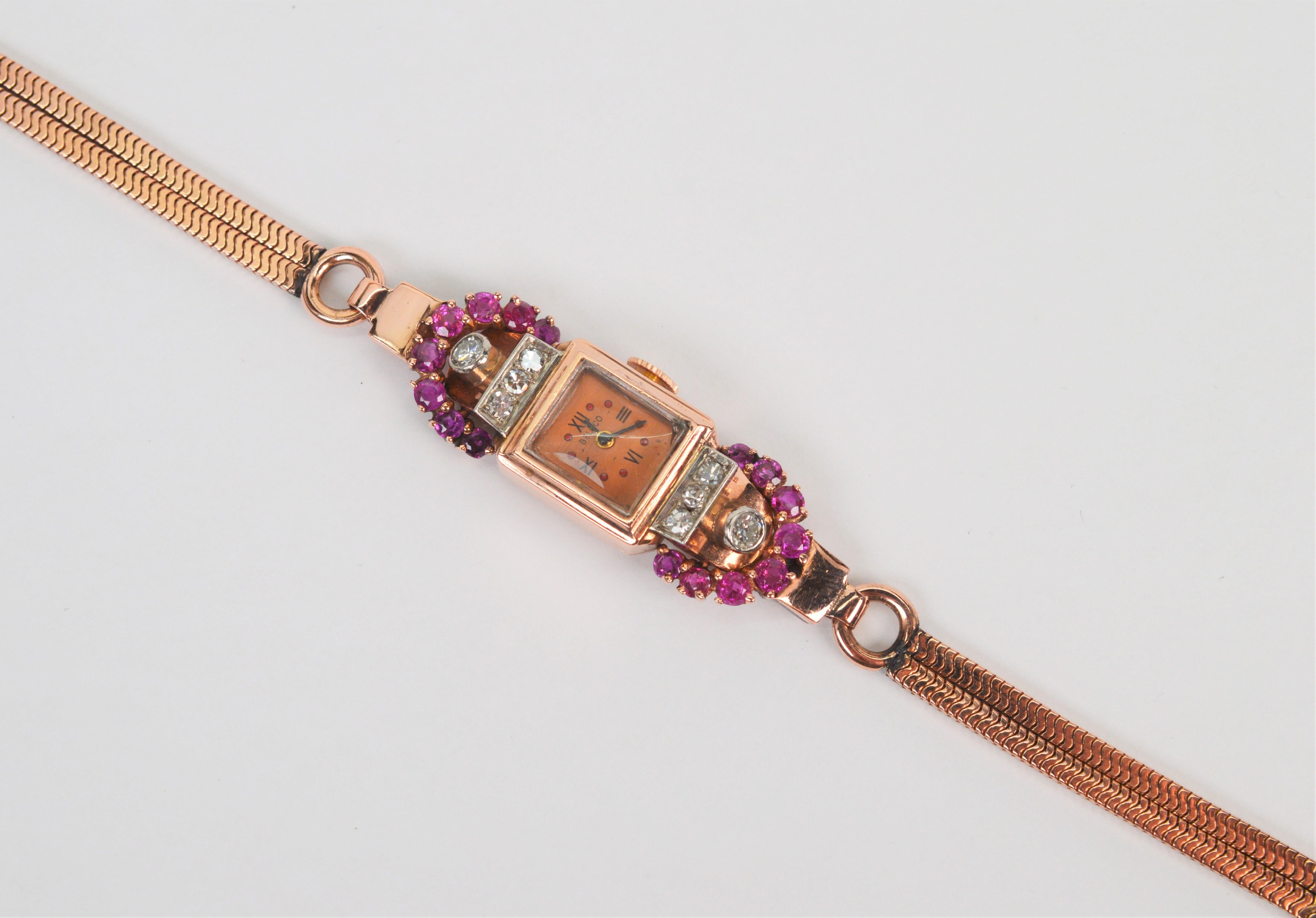 Montre-bracelet art déco en or rose 14 carats avec rubis et diamants en vente 14